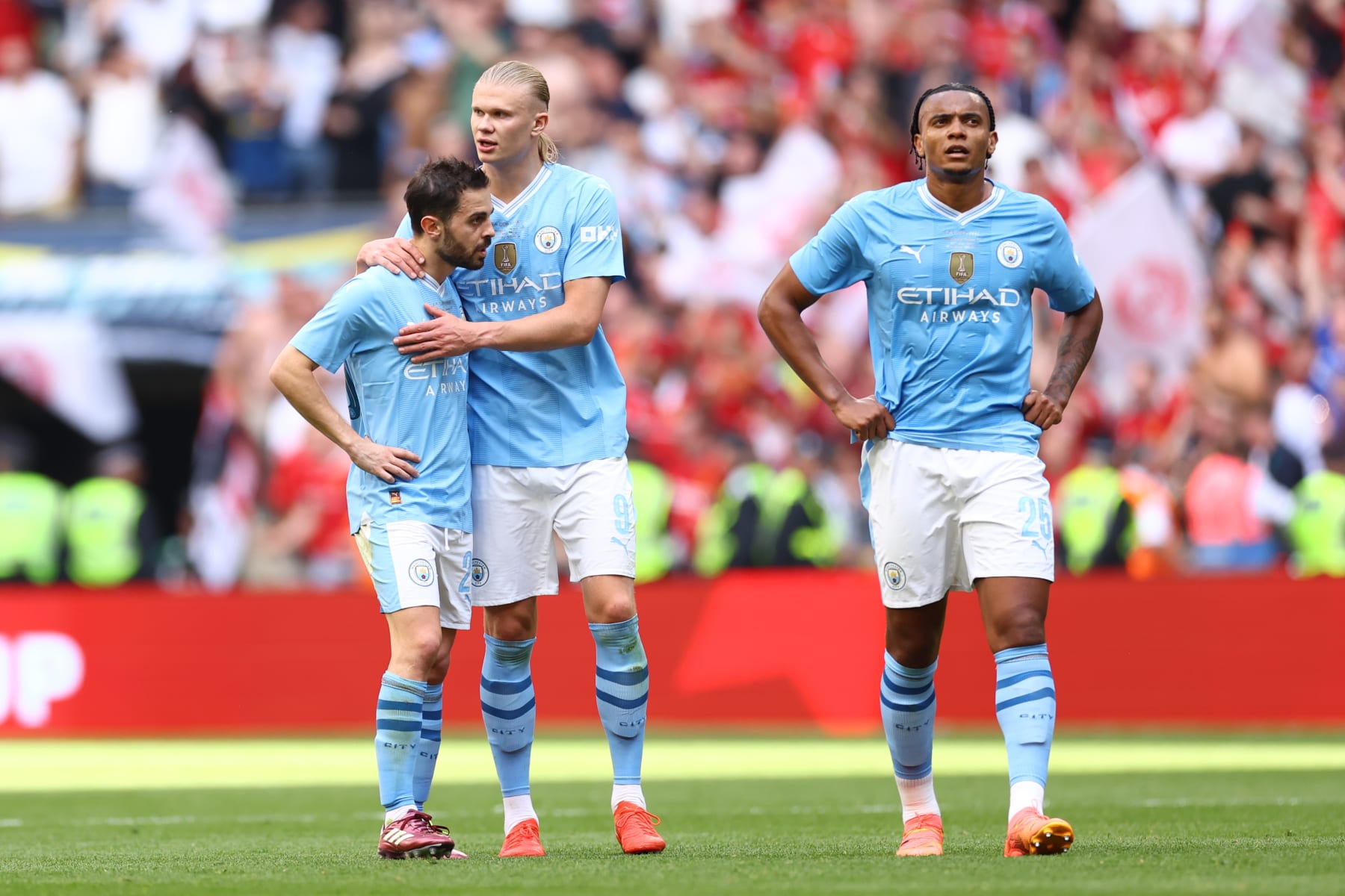 LONDON, ENGLAND - MAY 25: L-R Bernardo Silva, Erling Haaland and Manuel Akanji of Manchester City look dejected after full time during the Emirates FA Cup Final match between Manchester City and Manchester United at Wembley Stadium on May 25, 2024 in London, England.(Photo by Jacques Feeney/Offside/Offside via Getty Images)