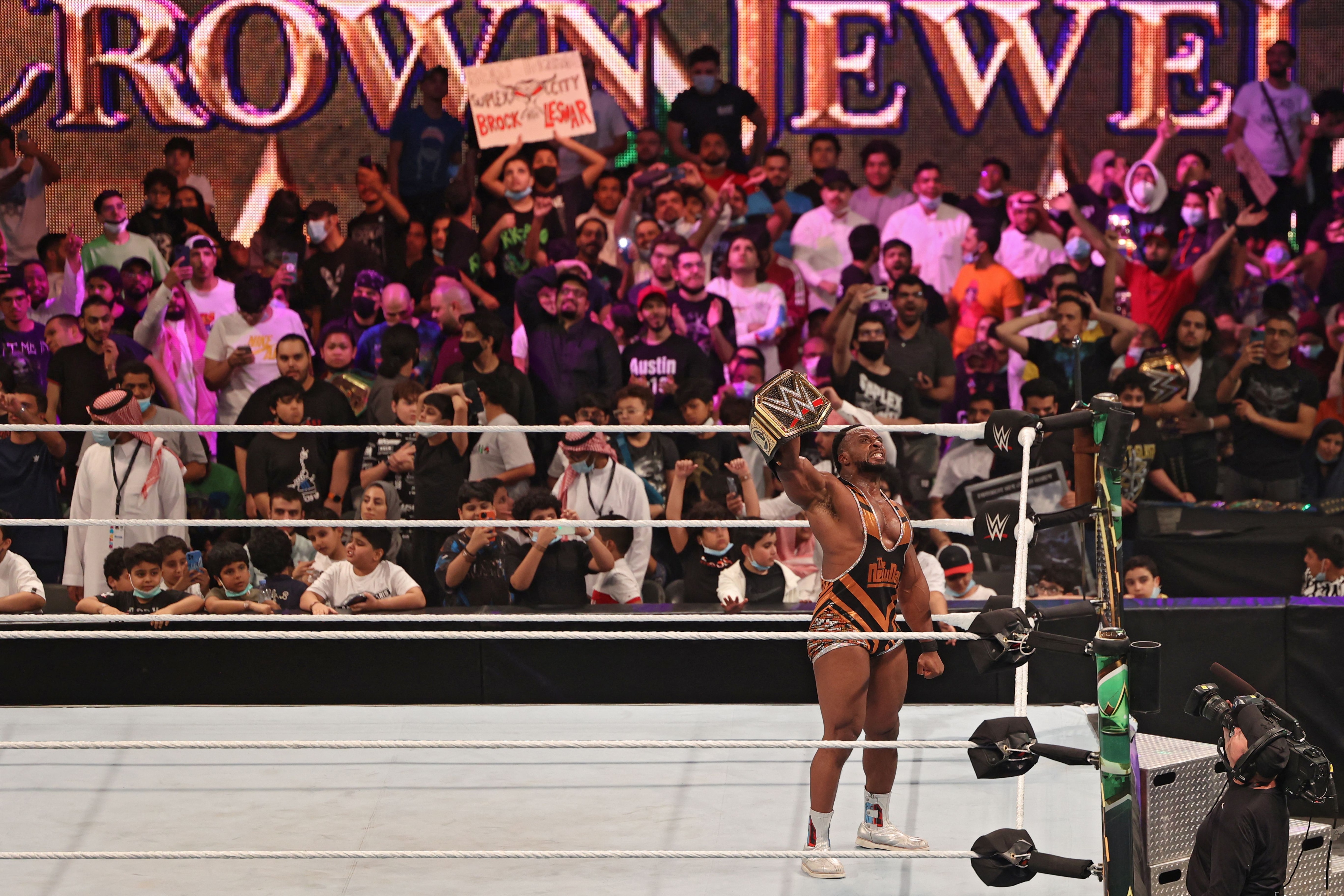 Big E celebrates his win during the World Wrestling Entertainment (WWE) Crown Jewel pay-per-view in the Saudi capital Riyadh on October 21, 2021. (Photo by Fayez Nureldine / AFP) (Photo by FAYEZ NURELDINE/AFP via Getty Images) Big E celebrates his win during the World Wrestling Entertainment (WWE) Crown Jewel pay-per-view in the Saudi capital Riyadh on October 21, 2021. (Photo by Fayez Nureldine / AFP) (Photo by FAYEZ NURELDINE/AFP via Getty Images)