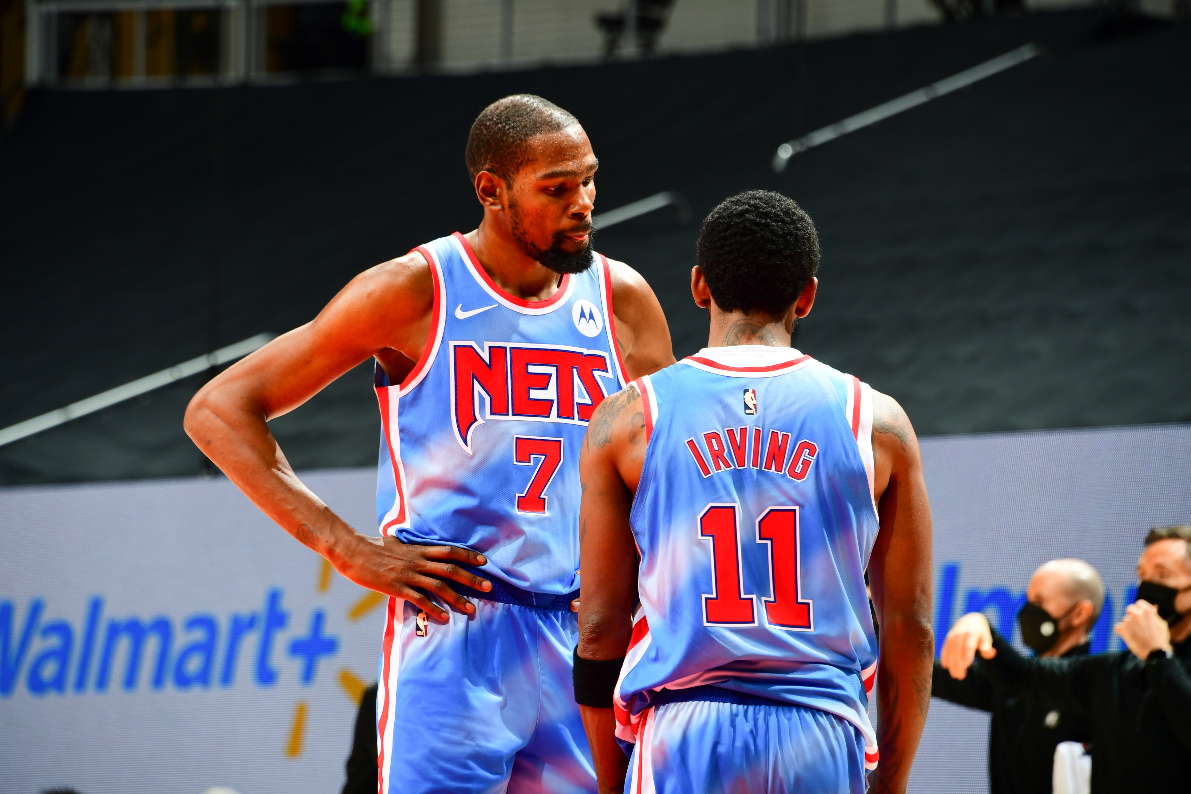 ATLANTA, GA - JANUARY 27: Kevin Durant #7 of the Brooklyn Nets talks to Kyrie Irving #11 of the Brooklyn Nets during the game against the Atlanta Hawks on January 27, 2021 at State Farm Arena in Atlanta, Georgia. NOTE TO USER: User expressly acknowledges and agrees that, by downloading and/or using this Photograph, user is consenting to the terms and conditions of the Getty Images License Agreement. Mandatory Copyright Notice: Copyright 2021 NBAE (Photo by Scott Cunningham/NBAE via Getty Images)