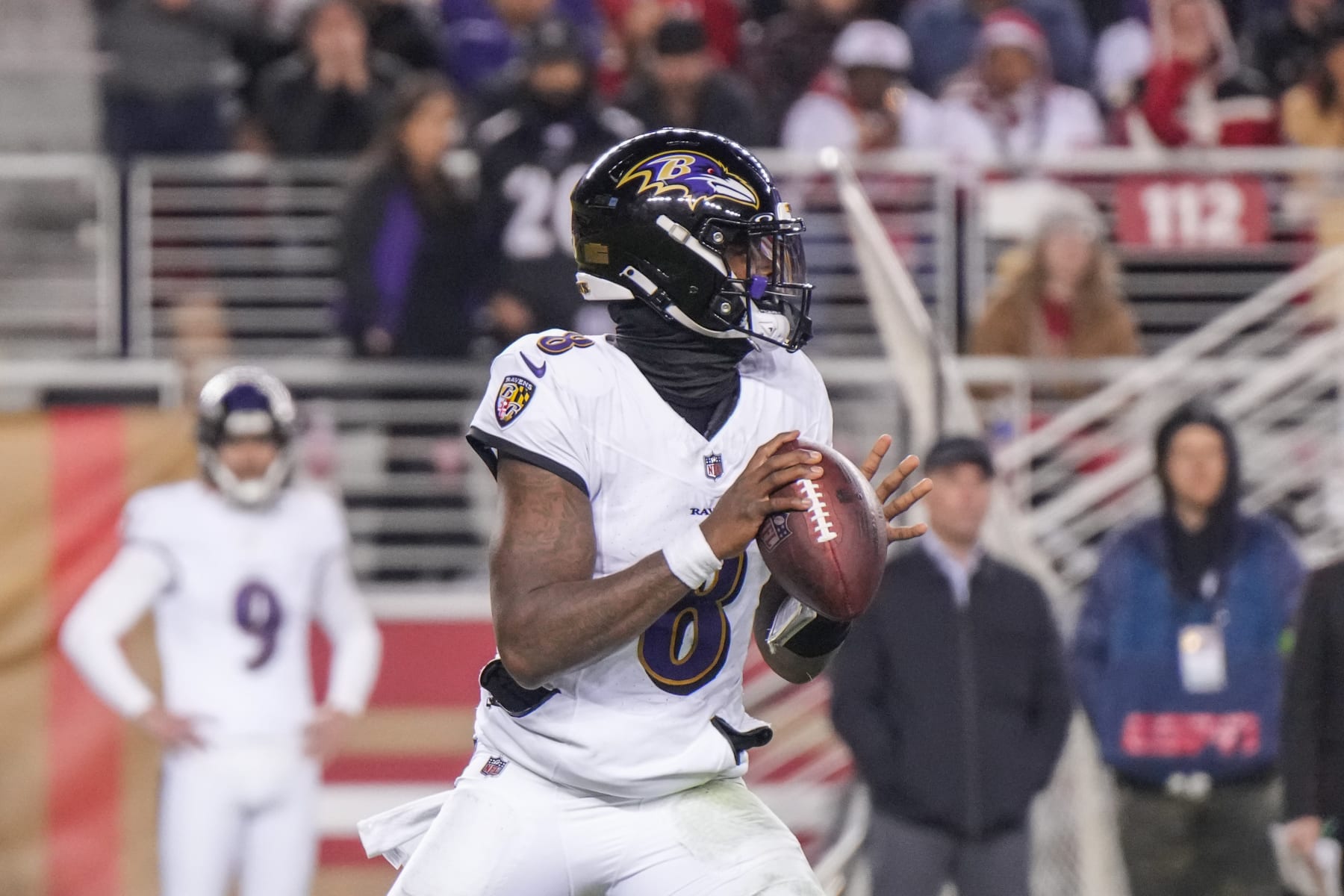 SANTA CLARA, CALIFORNIA - DECEMBER 25: Lamar Jackson #8 of the Baltimore Ravens looks to pass against the San Francisco 49ers during the second half at Levi's Stadium on December 25, 2023 in Santa Clara, California. (Photo by Loren Elliott/Getty Images)