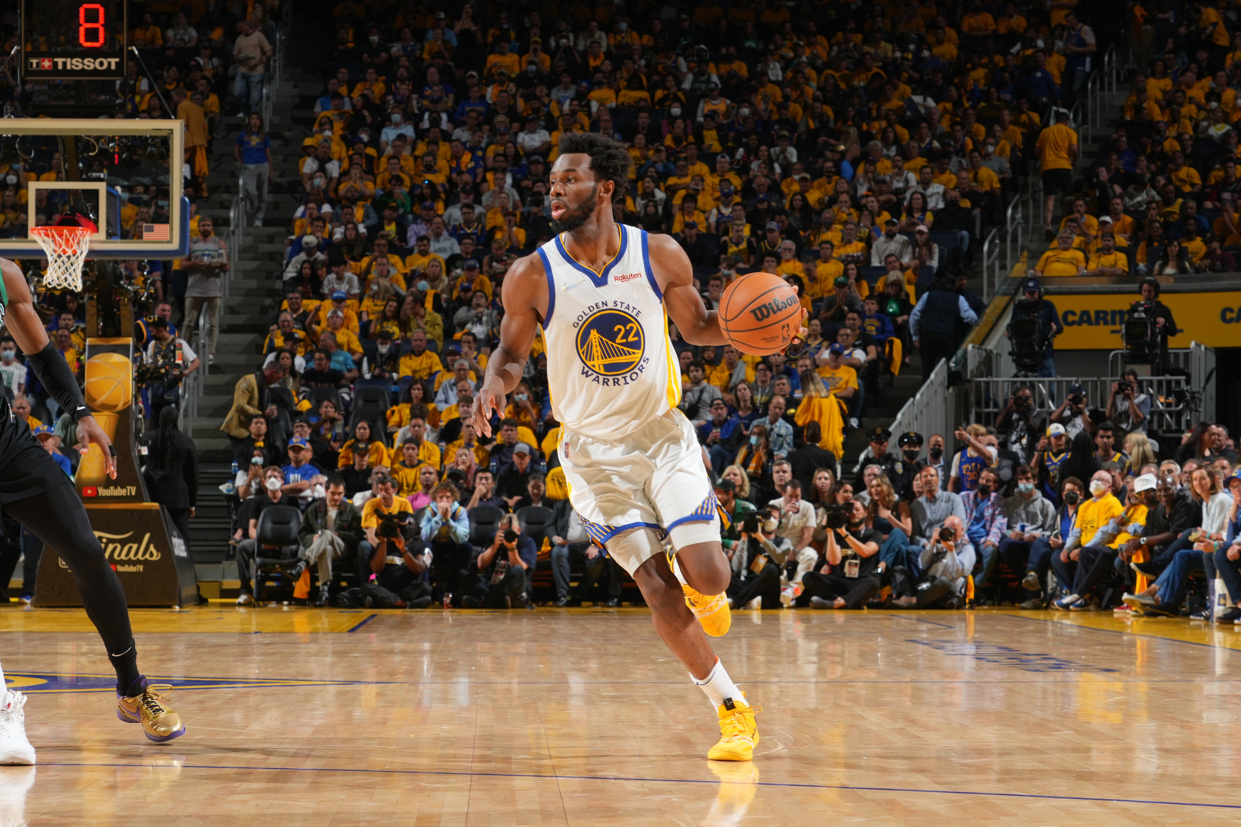 SAN FRANCISCO, CA - JUNE 13: Andrew Wiggins #22 of the Golden State Warriors dribbles the ball against the Boston Celtics during Game Five of the 2022 NBA Finals on June 13, 2022 at Chase Center in San Francisco, California. NOTE TO USER: User expressly acknowledges and agrees that, by downloading and or using this photograph, user is consenting to the terms and conditions of Getty Images License Agreement. Mandatory Copyright Notice: Copyright 2022 NBAE (Photo by Jesse D. Garrabrant/NBAE via Getty Images)