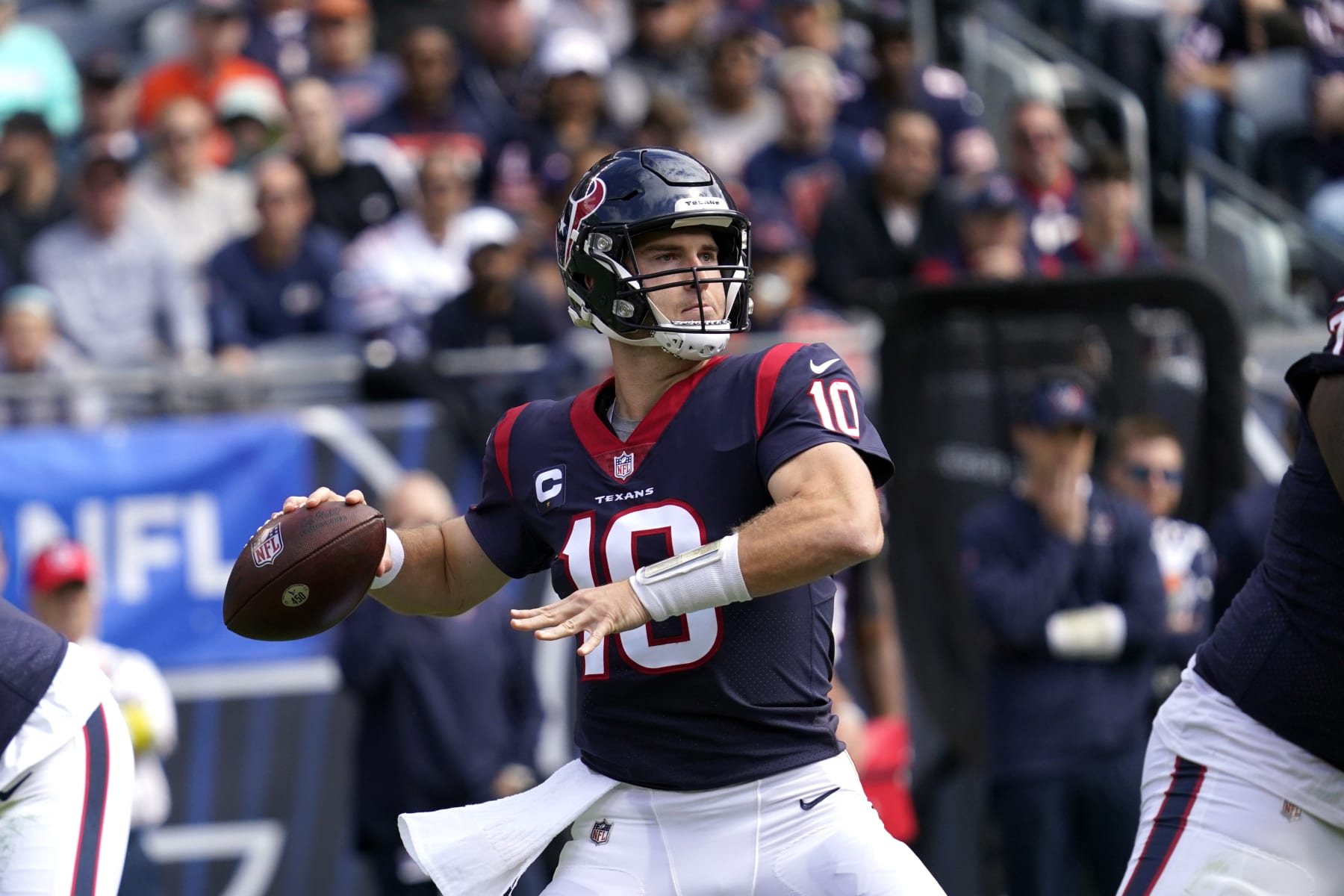 Houston Texans quarterback Davis Mills (10) throws a pass against the Chicago Bears during the first half of an NFL football game Sunday, Sept. 25, 2022, in Chicago. (AP Photo/Nam Y. Huh)