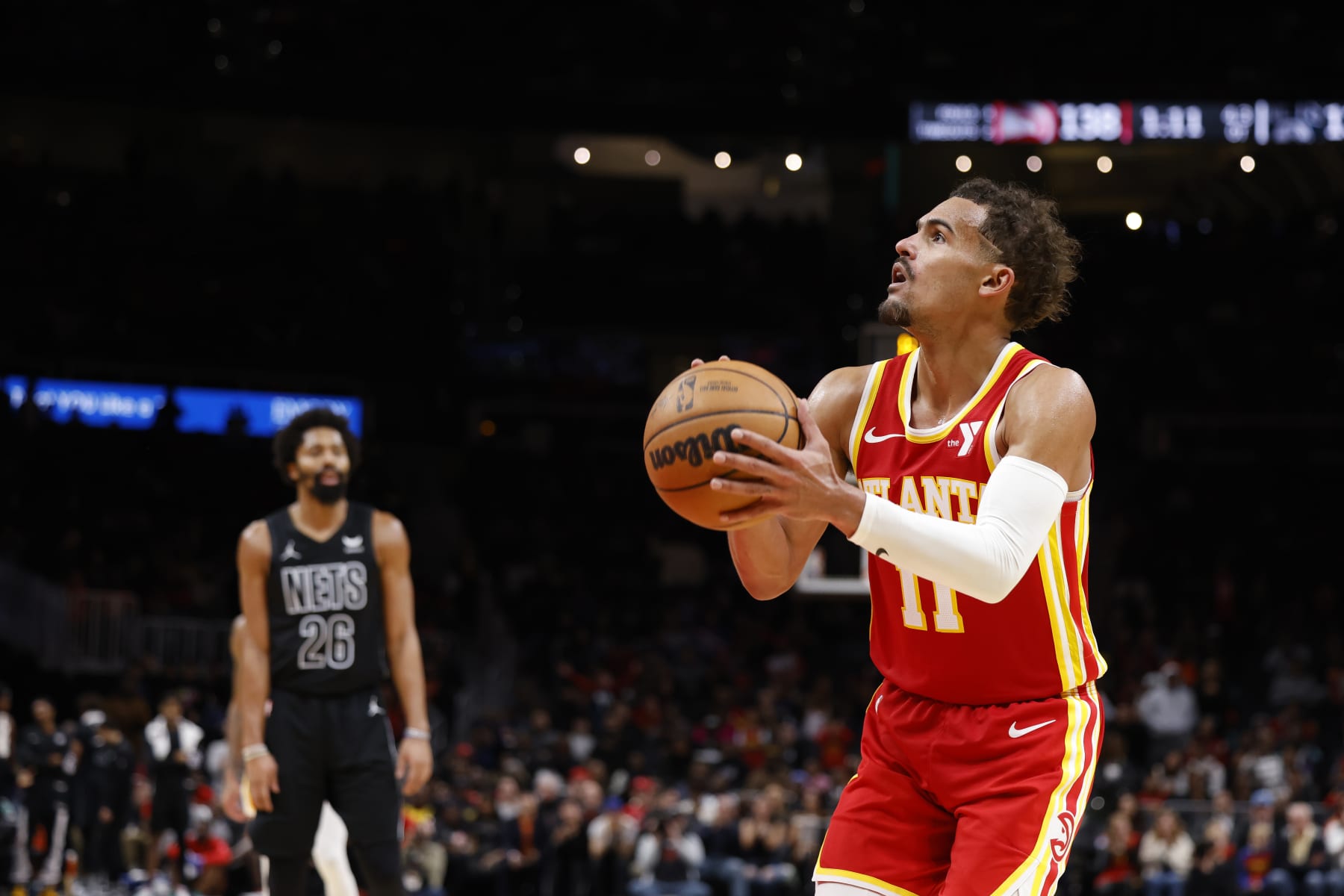 ATLANTA, GA - NOVEMBER 22: Trae Young #11 of the Atlanta Hawks shoots a free throw during the game against the Brooklyn Nets on NOVEMBER 22, 2023 at State Farm Arena in Atlanta, Georgia.  NOTE TO USER: User expressly acknowledges and agrees that, by downloading and/or using this Photograph, user is consenting to the terms and conditions of the Getty Images License Agreement. Mandatory Copyright Notice: Copyright 2023 NBAE (Photo by Mercedes Oliver/NBAE via Getty Images)