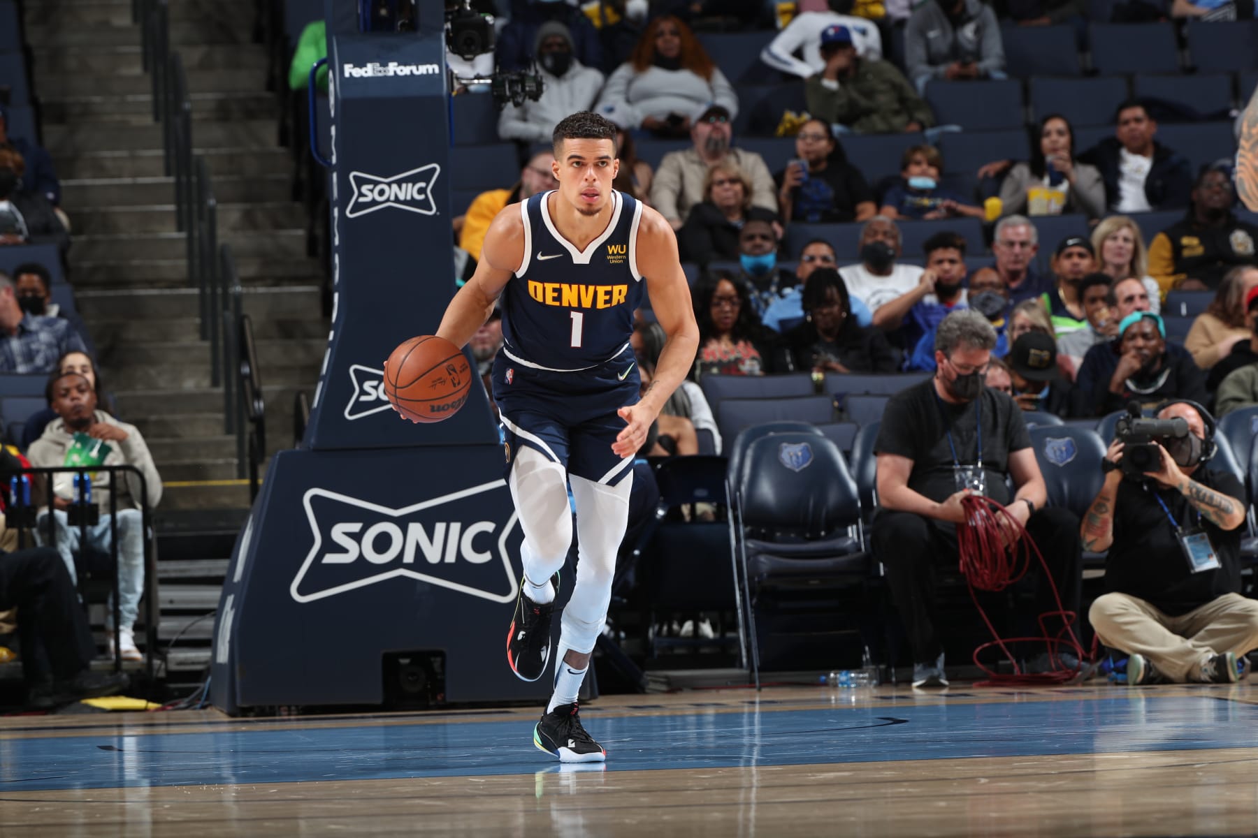 MEMPHIS, TN - NOVEMBER 1: Michael Porter Jr. #1 of the Denver Nuggets dribbles the ball up the court against the Memphis Grizzlies on November 1, 2021 at FedExForum in Memphis, Tennessee. NOTE TO USER: User expressly acknowledges and agrees that, by downloading and or using this photograph, User is consenting to the terms and conditions of the Getty Images License Agreement. Mandatory Copyright Notice: Copyright 2021 NBAE (Photo by Joe Murphy/NBAE via Getty Images)