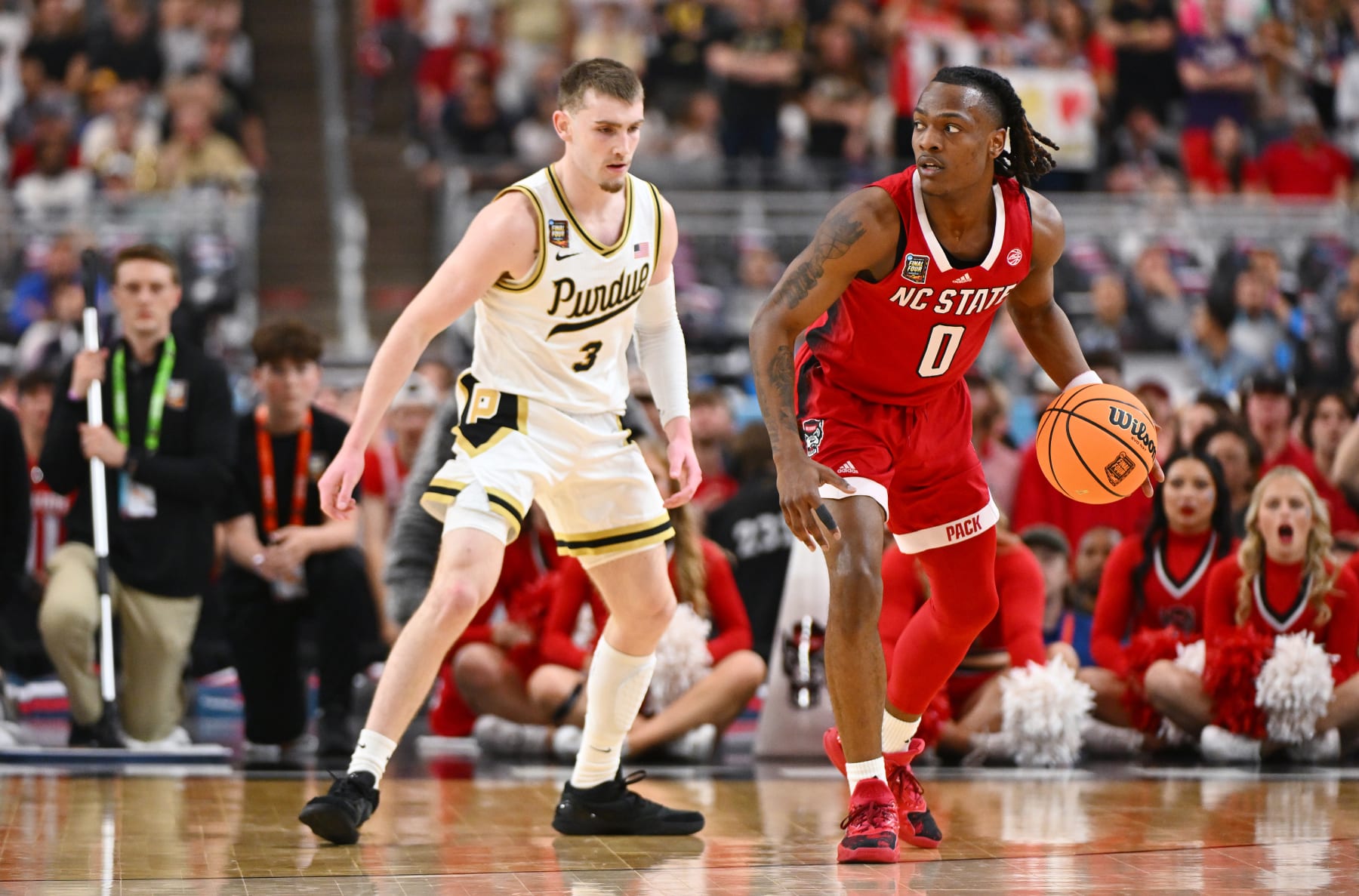 GLENDALE, ARIZONA - APRIL 06: DJ Horne #0 of the North Carolina State Wolfpack looks on against Braden Smith #3 of the Purdue Boilermakers during the second half in the NCAA Men’s Basketball Tournament Final Four semifinal game at State Farm Stadium on April 06, 2024 in Glendale, Arizona. (Photo by Brett Wilhelm/NCAA Photos via Getty Images)