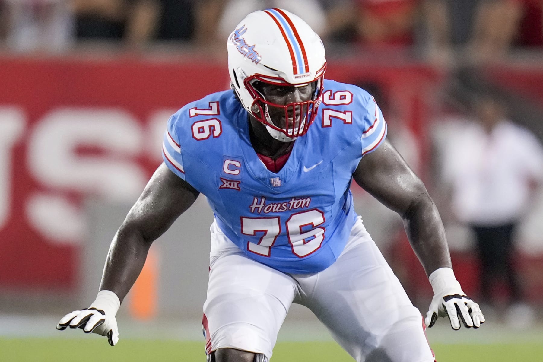 Houston offensive lineman Patrick Paul defends during the second half of an NCAA college football game against UTSA, Saturday, Sept. 2, 2023, in Houston. (AP Photo/Eric Christian Smith)