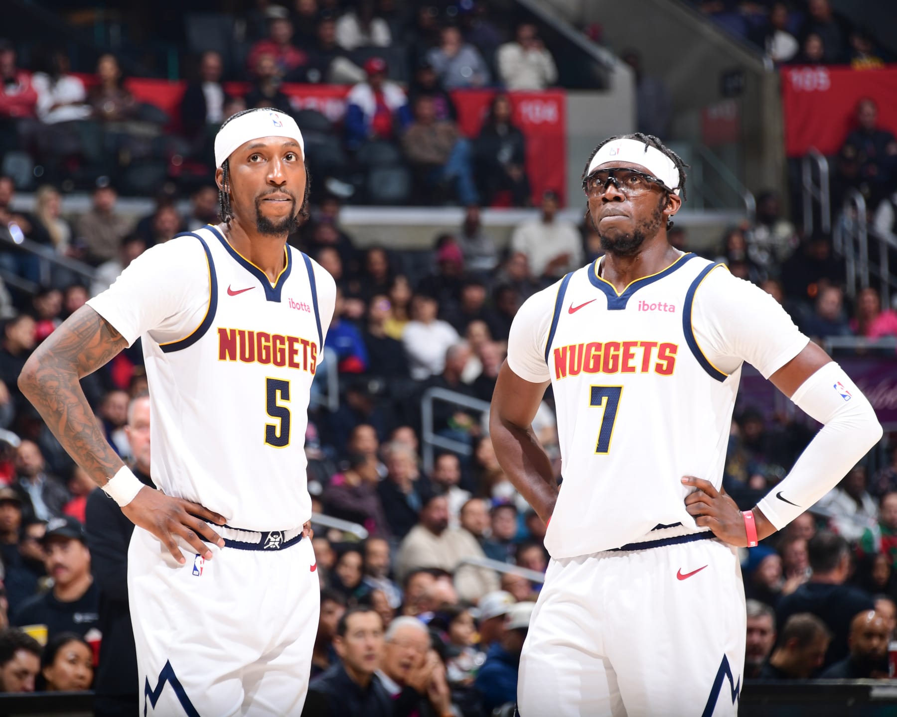 LOS ANGELES, CA - DECEMBER 6: Kentavious Caldwell-Pope #5 of the Denver Nuggets & Reggie Jackson #7 of the Denver Nuggets looks on during the game on December 6, 2023 at Crypto.Com Arena in Los Angeles, California. NOTE TO USER: User expressly acknowledges and agrees that, by downloading and/or using this Photograph, user is consenting to the terms and conditions of the Getty Images License Agreement. Mandatory Copyright Notice: Copyright 2023 NBAE (Photo by Adam Pantozzi/NBAE via Getty Images)