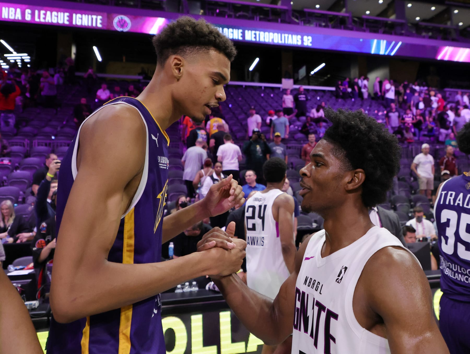 HENDERSON, NEVADA - OCTOBER 04: Victor Wembanyama #1 of Boulogne-Levallois Metropolitans 92 and Scoot Henderson #0 of G League Ignite shake hands after their exhibition game at The Dollar Loan Center on October 04, 2022 in Henderson, Nevada. Ignite defeated Metropolitans 92 122-115. NOTE TO USER: User expressly acknowledges and agrees that, by downloading and or using this photograph, User is consenting to the terms and conditions of the Getty Images License Agreement. (Photo by Ethan Miller/Getty Images) HENDERSON, NEVADA - OCTOBER 04: Victor Wembanyama #1 of Boulogne-Levallois Metropolitans 92 and Scoot Henderson #0 of G League Ignite shake hands after their exhibition game at The Dollar Loan Center on October 04, 2022 in Henderson, Nevada. Ignite defeated Metropolitans 92 122-115. NOTE TO USER: User expressly acknowledges and agrees that, by downloading and or using this photograph, User is consenting to the terms and conditions of the Getty Images License Agreement. (Photo by Ethan Miller/Getty Images)