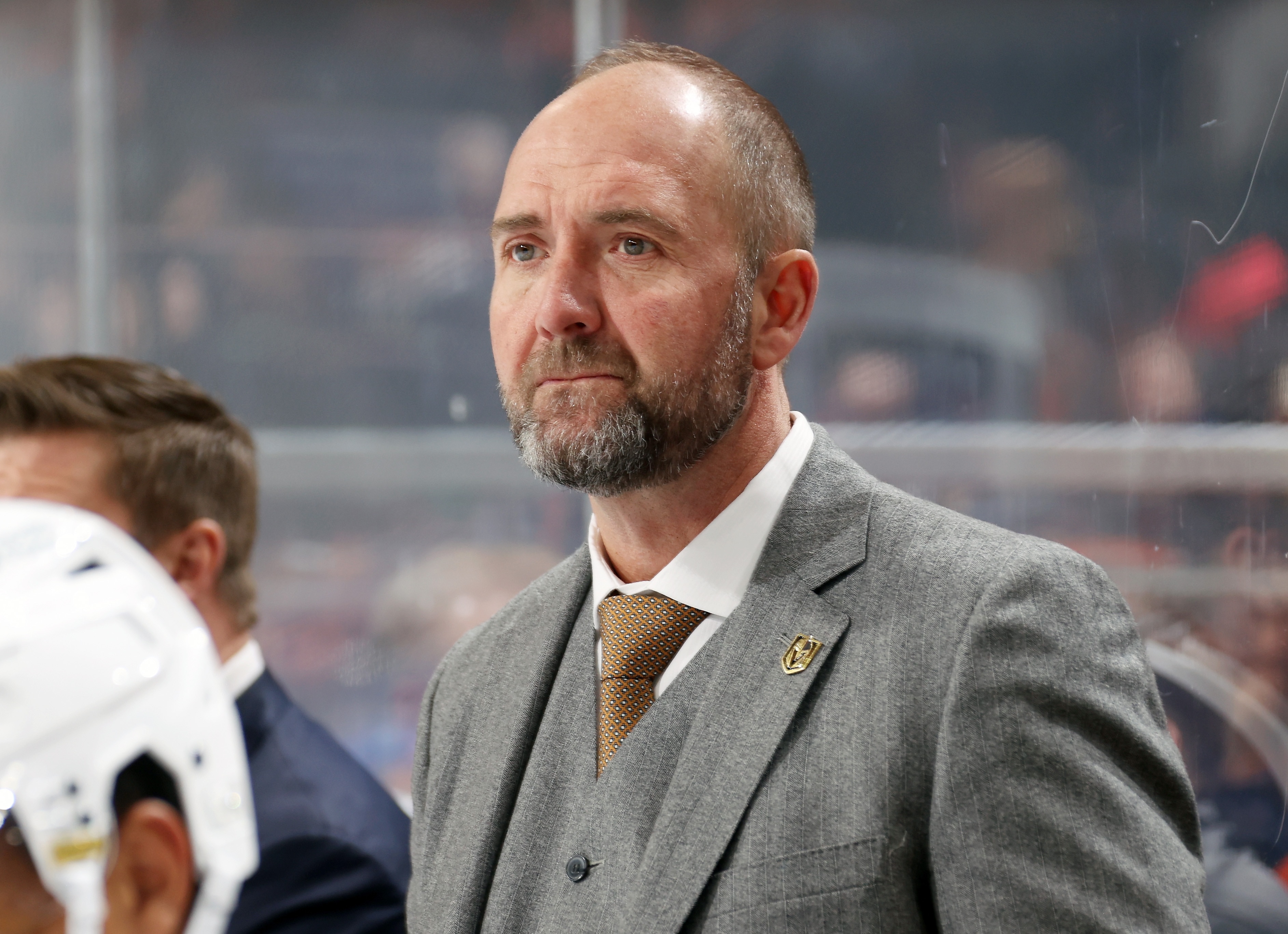 PHILADELPHIA, PA - MARCH 08:  Head Coach of the Vegas Golden Knights Peter DeBoer looks on from his bench during the first period against the Philadelphia Flyers at the Wells Fargo Center on March 8, 2022 in Philadelphia, Pennsylvania.  (Photo by Len Redkoles/NHLI via Getty Images)