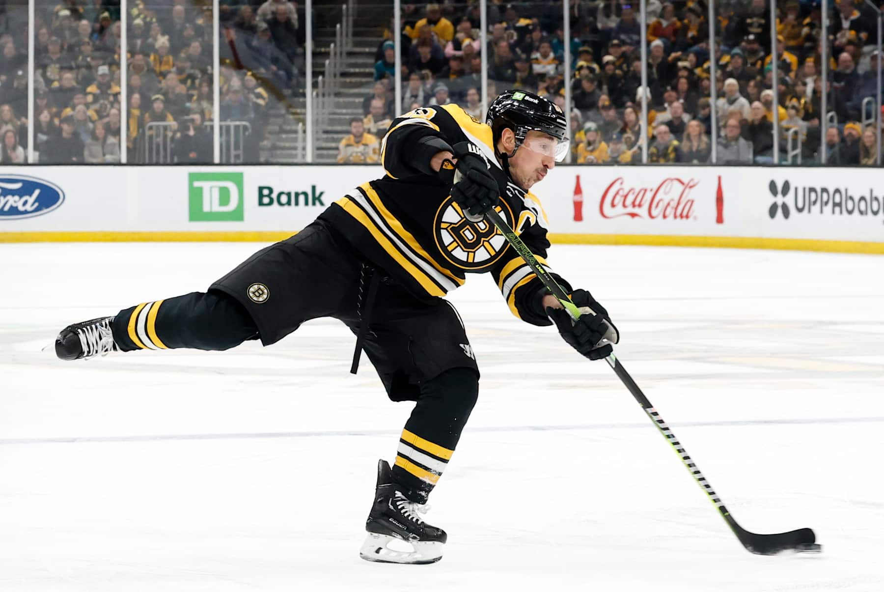 BOSTON, MA - JANUARY 20: Boston Bruins left wing Brad Marchand (63) fires a shot during a game between the Boston Bruins and the San Jose Sharks on January 20, 2025, at TD Garden in Boston, Massachusetts. (Photo by Fred Kfoury III/Icon Sportswire via Getty Images)