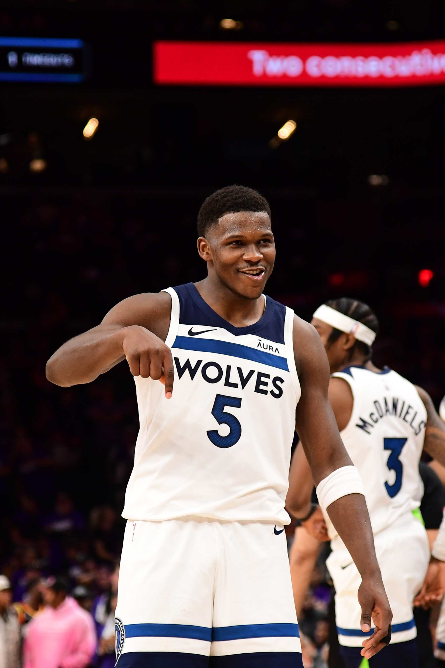 PHOENIX, AZ - APRIL  28: Anthony Edwards #5 of the Minnesota Timberwolves celebrates during the game against the Phoenix Suns during Round 1 Game 4 of the 2024 NBA Playoffs on April 28, 2024 at Footprint Center in Phoenix, Arizona. NOTE TO USER: User expressly acknowledges and agrees that, by downloading and or using this photograph, user is consenting to the terms and conditions of the Getty Images License Agreement. Mandatory Copyright Notice: Copyright 2024 NBAE (Photo by Kate Frese/NBAE via Getty Images)