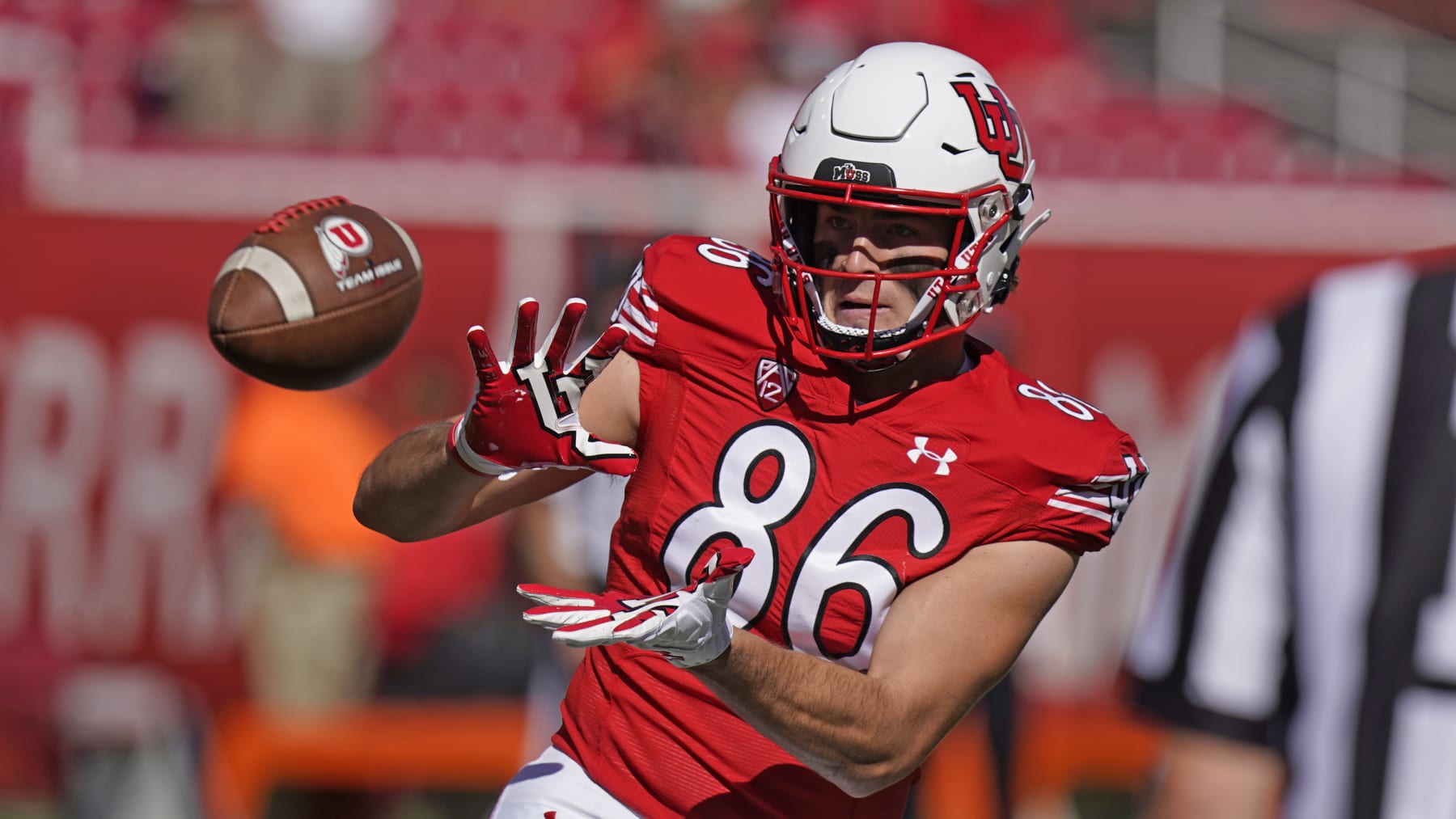 Utah tight end Dalton Kincaid (86) warms up before their NCAA college football game against Oregon State Saturday, Oct. 1, 2022, in Salt Lake City. (AP Photo/Rick Bowmer)