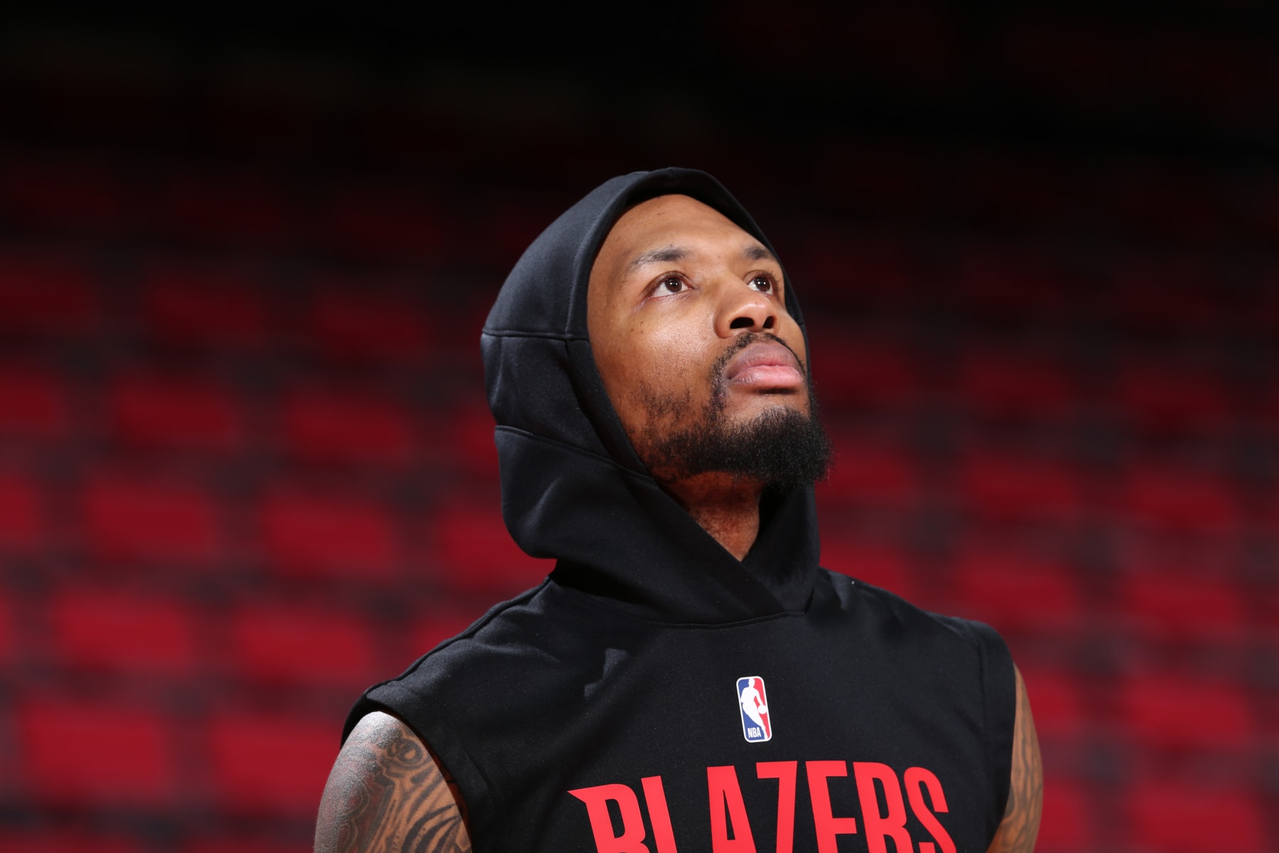 PORTLAND, OR - NOVEMBER 17: Damian Lillard #0 of the Portland Trail Blazers looks on before the game against the Brooklyn Nets on November 17, 2022 at the Moda Center Arena in Portland, Oregon. NOTE TO USER: User expressly acknowledges and agrees that, by downloading and or using this photograph, user is consenting to the terms and conditions of the Getty Images License Agreement. Mandatory Copyright Notice: Copyright 2022 NBAE (Photo by Sam Forencich/NBAE via Getty Images)