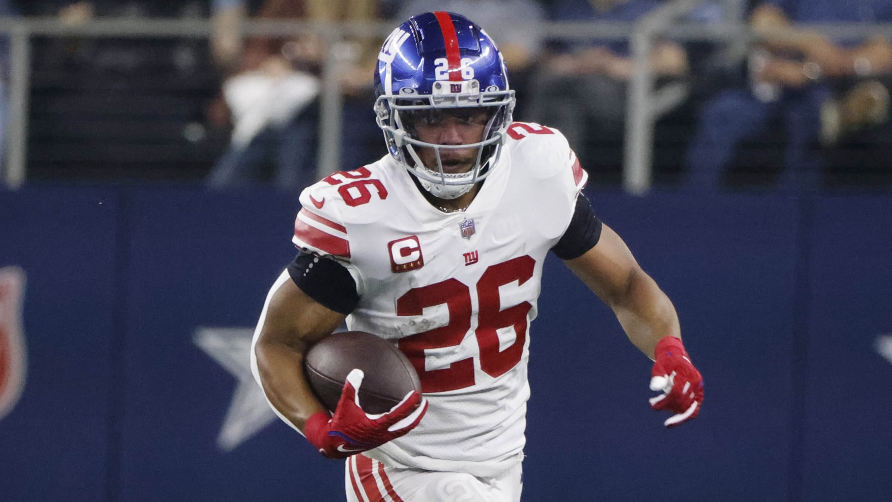 New York Giants running back Saquon Barkley (26) runs against the Dallas Cowboys during an NFL Football game in Arlington, Texas, Thursday, Nov. 24, 2022. (AP Photo/Michael Ainsworth)