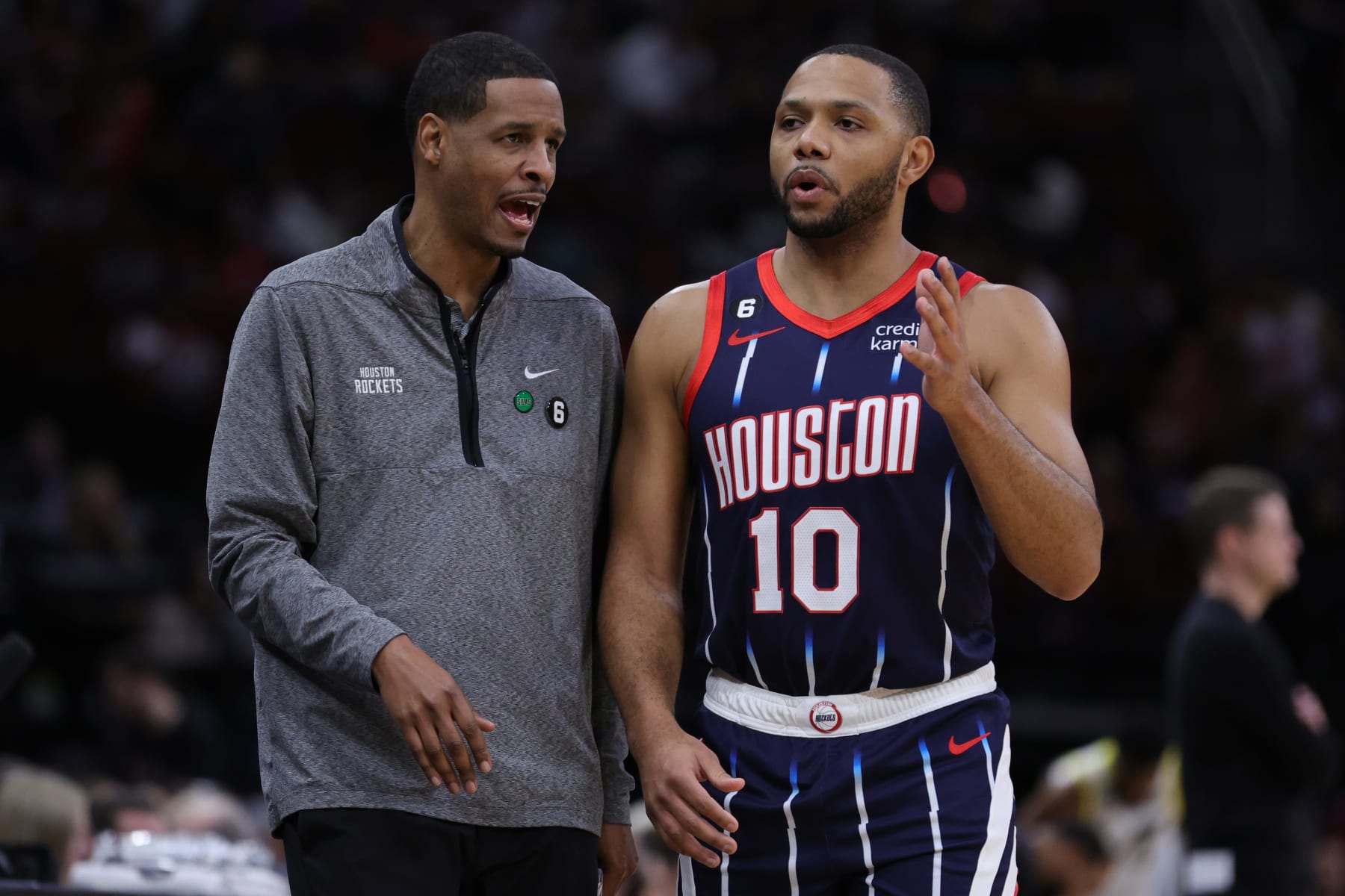 HOUSTON, TEXAS - JANUARY 05: Eric Gordon #10 speaks with Stephen Silas head coach of the Houston Rockets during the first half against the Utah Jazzat Toyota Center on January 05, 2023 in Houston, Texas. NOTE TO USER: User expressly acknowledges and agrees that, by downloading and or using this photograph, User is consenting to the terms and conditions of the Getty Images License Agreement. (Photo by Carmen Mandato/Getty Images)