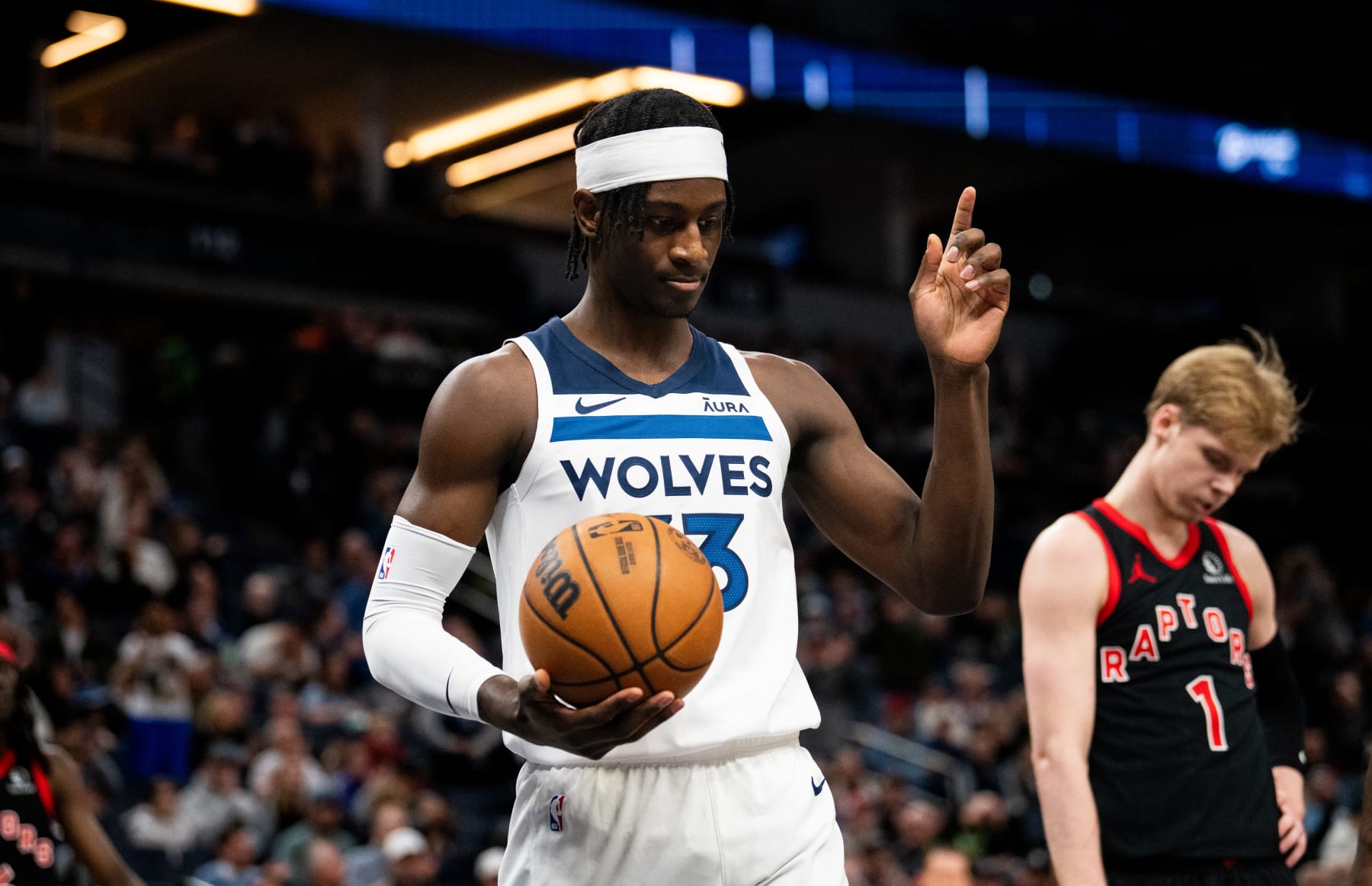 MINNEAPOLIS, MINNESOTA - APRIL 3: Leonard Miller #33 of the Minnesota Timberwolves reacts after a play in the fourth quarter of the game against the Toronto Raptors at Target Center on April 3, 2024 in Minneapolis, Minnesota. NOTE TO USER: User expressly acknowledges and agrees that, by downloading and or using this photograph, User is consenting to the terms and conditions of the Getty Images License Agreement. (Photo by Stephen Maturen/Getty Images)