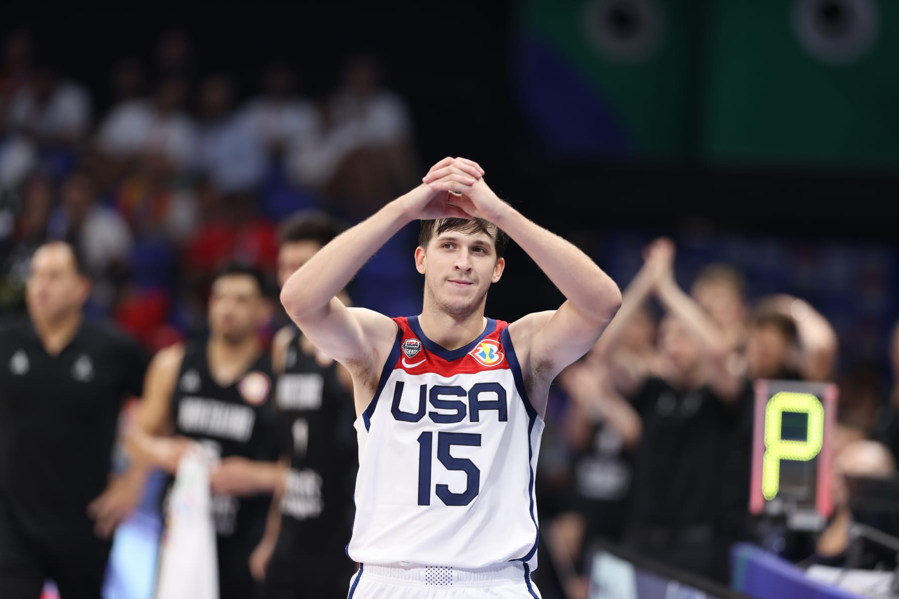 MANILA, PHILIPPINES - AUGUST 26: Austin Reaves #15  of the USA Men's Senior National Team celebrates against New Zealand as part of the 2023 FIBA World Cup on August 26, 2023 at Mall of Asia Arena in Manila, Philippines. NOTE TO USER: User expressly acknowledges and agrees that, by downloading and/or using this photograph, user is consenting to the terms and conditions of the Getty Images License Agreement. Mandatory Copyright Notice: Copyright 2023 NBAE (Photo by Stephen Gosling/NBAE via Getty Images)