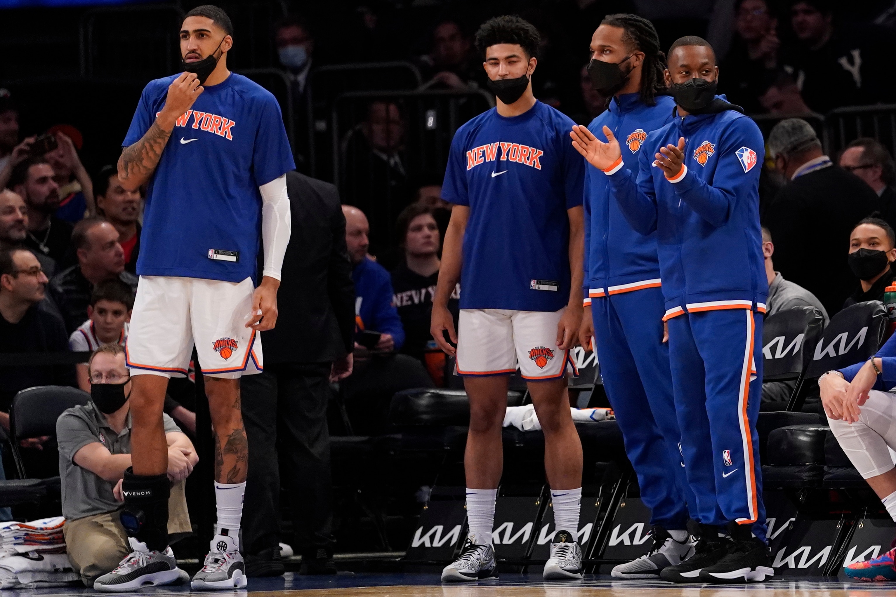 New York Knicks guard Kemba Walker, right, watches from the bench in the second half of an NBA basketball game against the Chicago Bulls, Thursday, Dec. 2, 2021, at Madison Square Garden in New York. (AP Photo/Mary Altaffer)