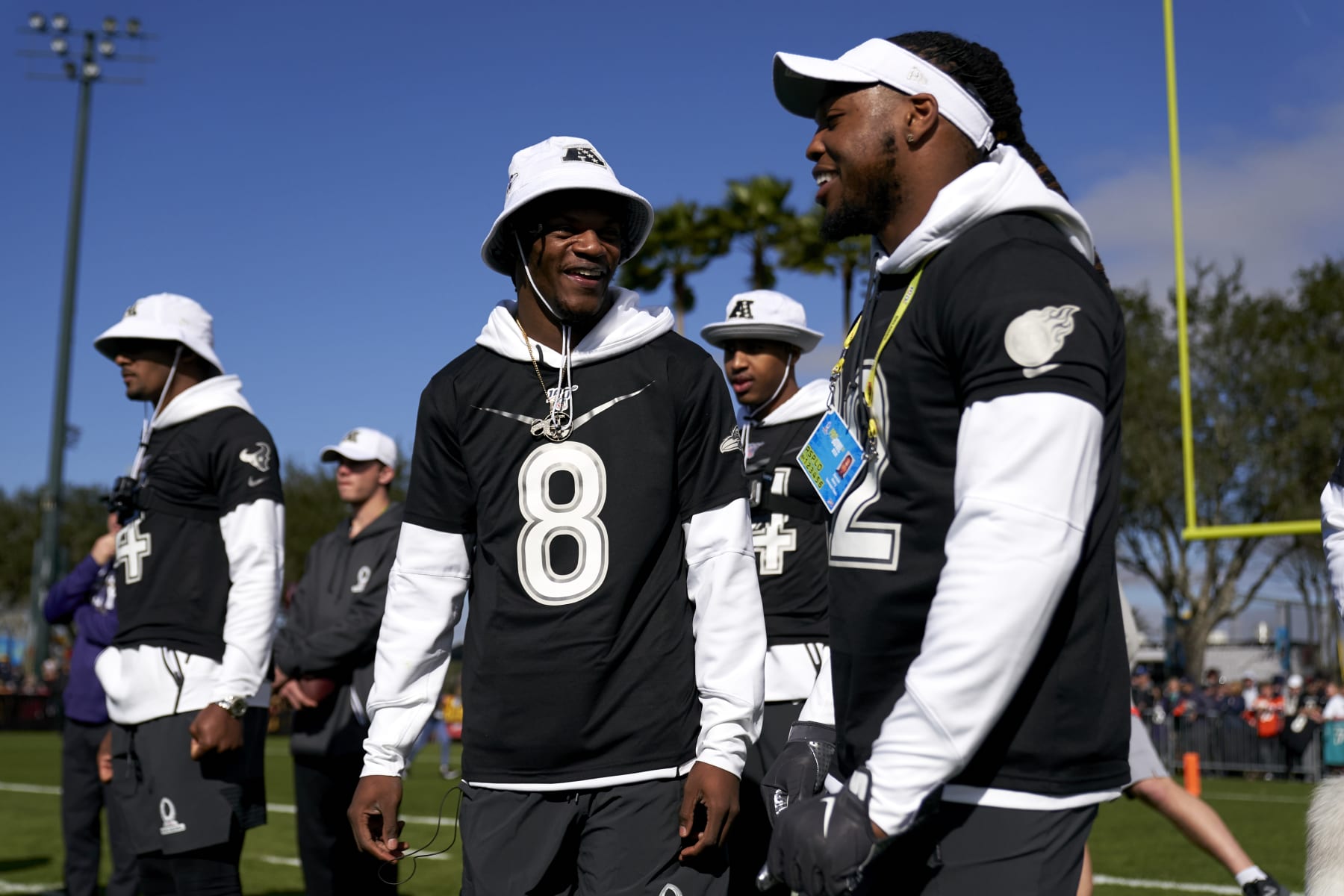KISSIMMEE, FLORIDA - JANUARY 22: Lamar Jackson #8 of the Baltimore Ravens visits with Derrick Henry #22 of the Tennessee Titans during the AFC team practice in preparation for the 2020 Pro Bowl, Wednesday, Jan. 22, 2020, in Kissimmee, Florida. (Photo by Cooper Neill/Getty Images)