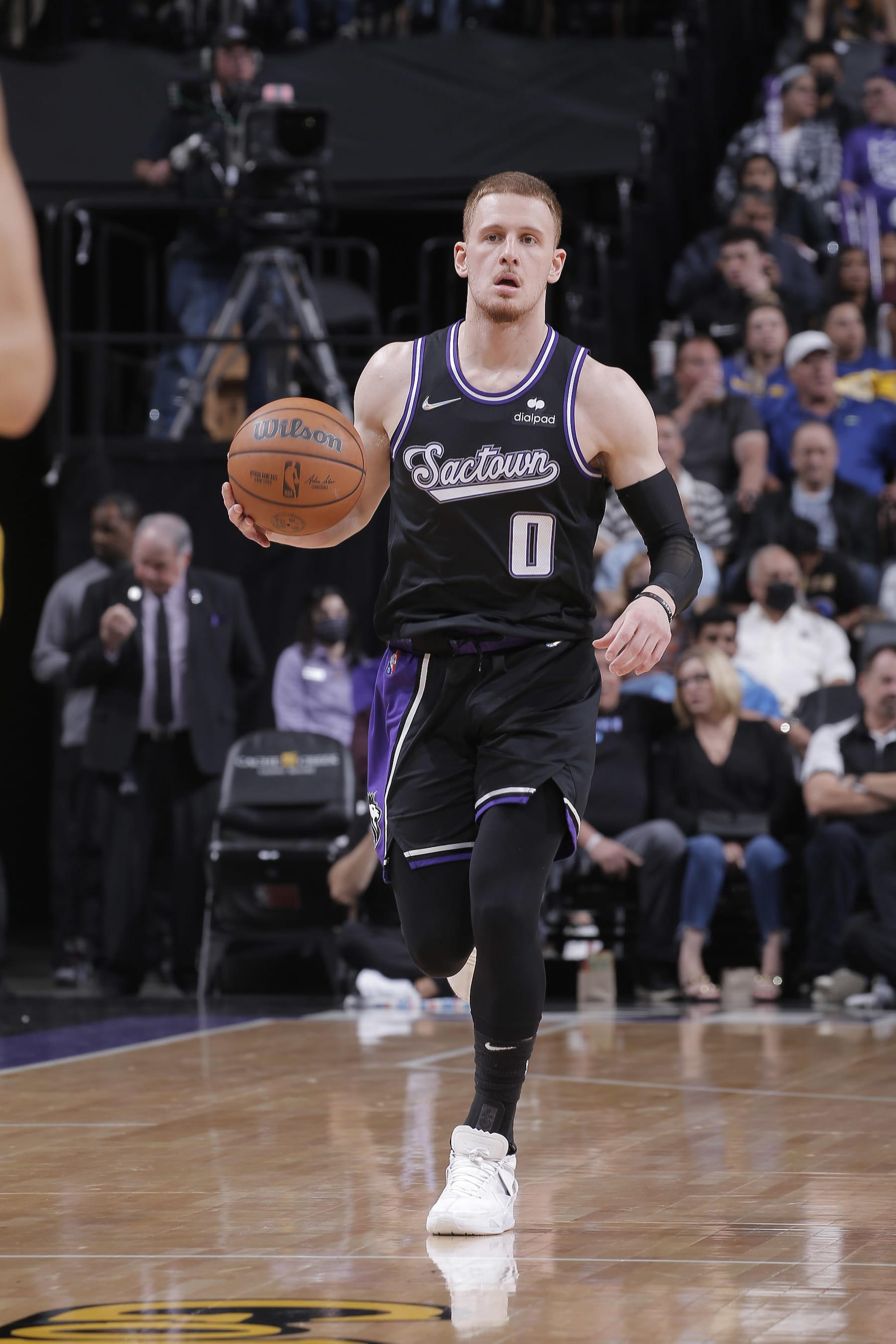 SACRAMENTO, CA - APRIL 3: Donte DiVincenzo #0 of the Sacramento Kings brings the ball up the court against the Golden State Warriors on April 3, 2022 at Golden 1 Center in Sacramento, California. NOTE TO USER: User expressly acknowledges and agrees that, by downloading and or using this photograph, User is consenting to the terms and conditions of the Getty Images Agreement. Mandatory Copyright Notice: Copyright 2022 NBAE (Photo by Rocky Widner/NBAE via Getty Images)