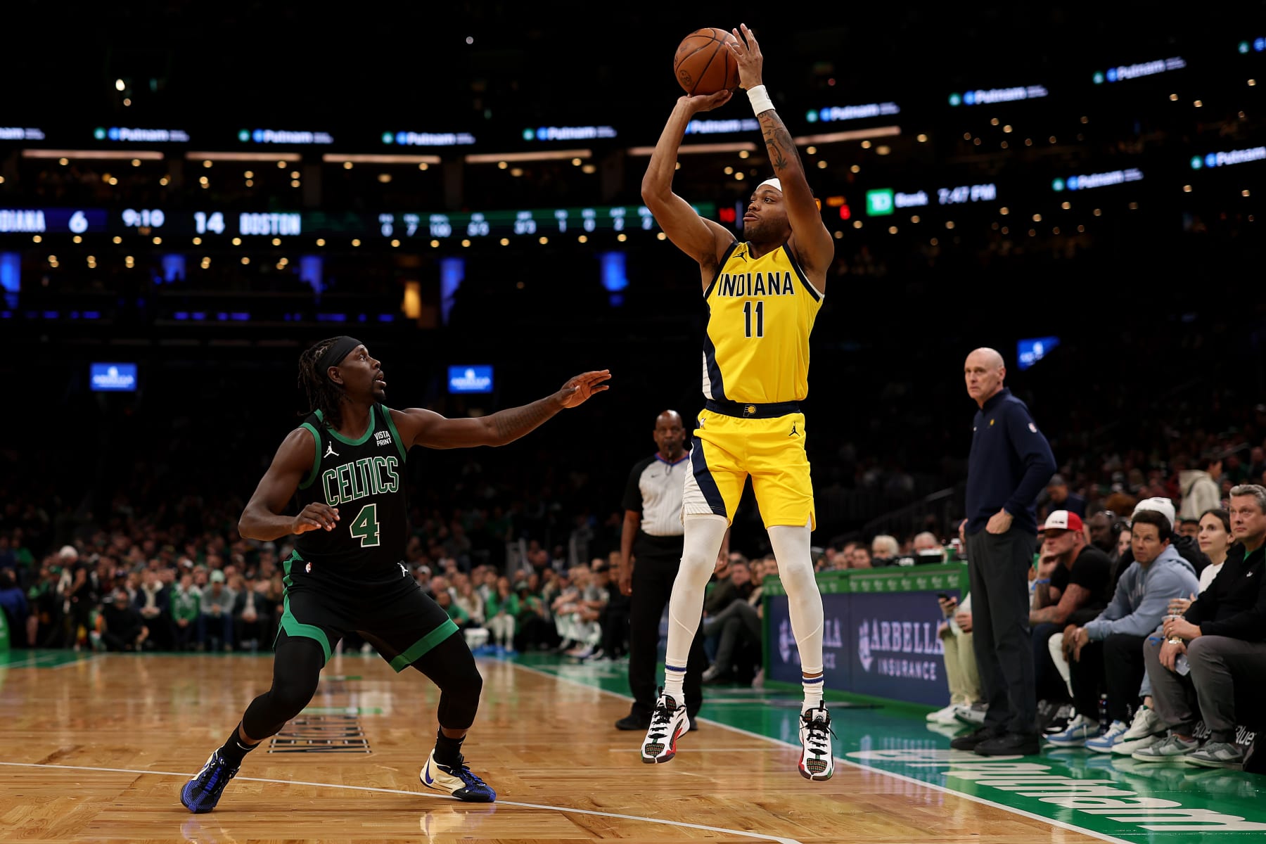 BOSTON, MASSACHUSETTS - NOVEMBER 01: Bruce Brown #11 of the Indiana Pacers takes a shot over Jrue Holiday #4 of the Boston Celtics  during the first quarter at TD Garden on November 01, 2023 in Boston, Massachusetts. NOTE TO USER: User expressly acknowledges and agrees that, by downloading and or using this photograph, User is consenting to the terms and conditions of the Getty Images License Agreement.  (Photo by Maddie Meyer/Getty Images)