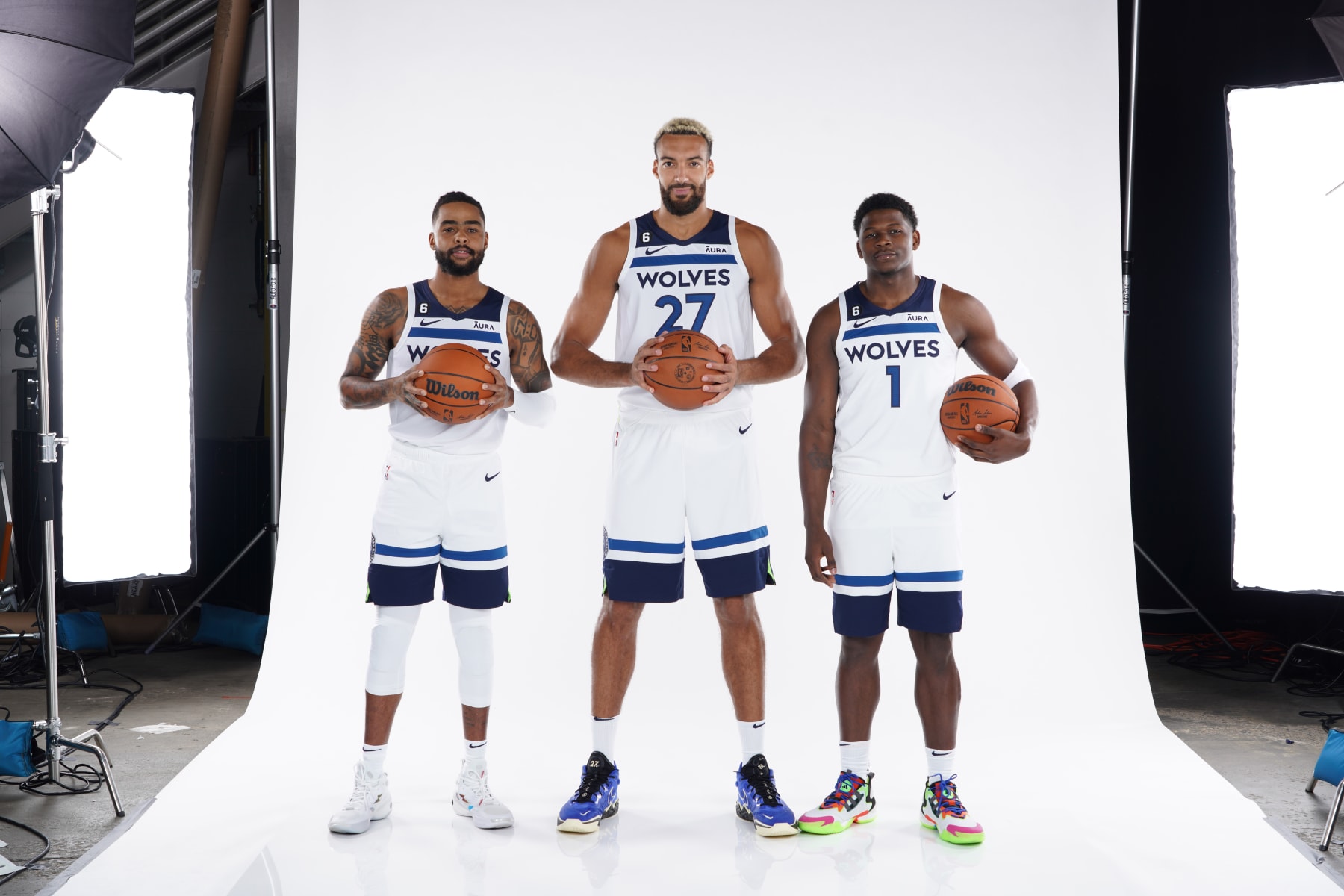 MINNEAPOLIS, MN - SEPTEMBER 26: D'Angelo Russell #0, Rudy Gobert #27, and Anthony Edwards #1 of the Minnesota Timberwolves pose for a portrait during 2022 Media Day on September 26, 2022 at Target Center in Minneapolis, Minnesota.  NOTE TO USER:  User expressly acknowledges and agrees that, by downloading and or using this Photograph, user is consenting to the terms and conditions of the Getty Images License Agreement. Mandatory Copyright Notice: Copyright 2022 NBAE (Photo by Jordan Johnson/NBAE via Getty Images)