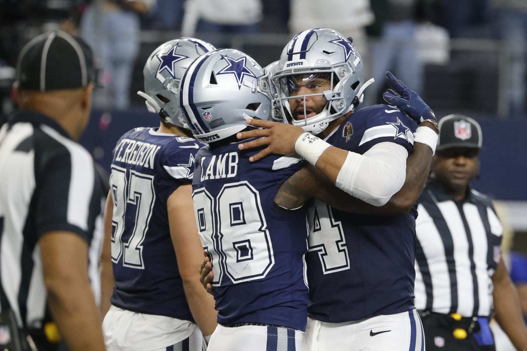 Dallas Cowboys wide receiver CeeDee Lamb (88) and Dallas Cowboys quarterback Dak Prescott (4) celebrate their touchdown during the first half of an NFL football game against the Los Angeles Rams, Sunday, Oct. 29, 2023, in Arlington, Texas. (AP Photo/Michael Ainsworth) Dallas Cowboys wide receiver CeeDee Lamb (88) and Dallas Cowboys quarterback Dak Prescott (4) celebrate their touchdown during the first half of an NFL football game against the Los Angeles Rams, Sunday, Oct. 29, 2023, in Arlington, Texas. (AP Photo/Michael Ainsworth)