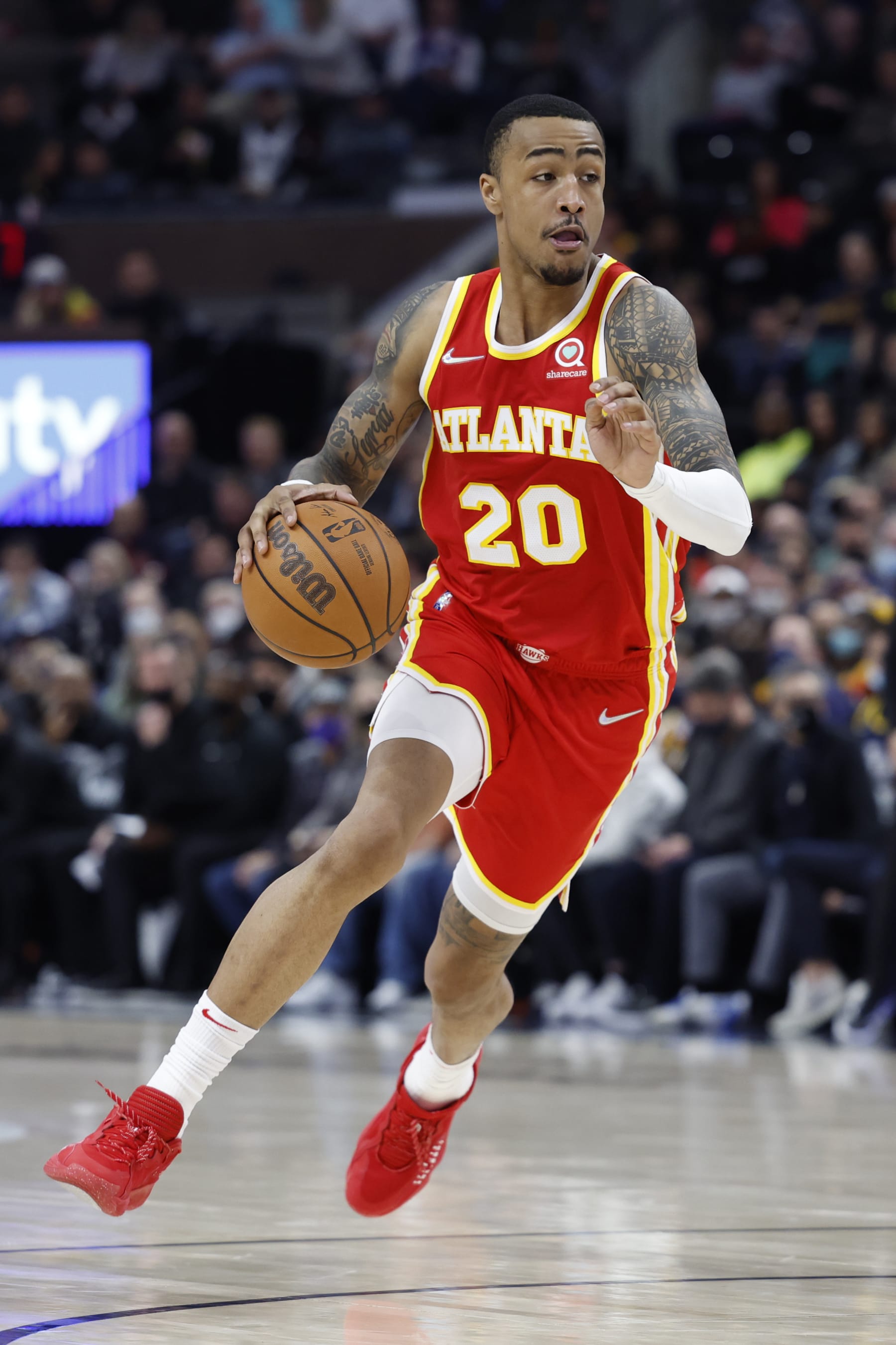 SALT LAKE CITY, UT - NOVEMBER 9: John Collins #20 of the Atlanta Hawks drives to the basket during the game against the Utah Jazz on November 9, 2021 at Vivint Smart Home Arena in Salt Lake City, Utah. NOTE TO USER: User expressly acknowledges and agrees that, by downloading and or using this Photograph, User is consenting to the terms and conditions of the Getty Images License Agreement. Mandatory Copyright Notice: Copyright 2021 NBAE (Photo by Jeff Swinger/NBAE via Getty Images)