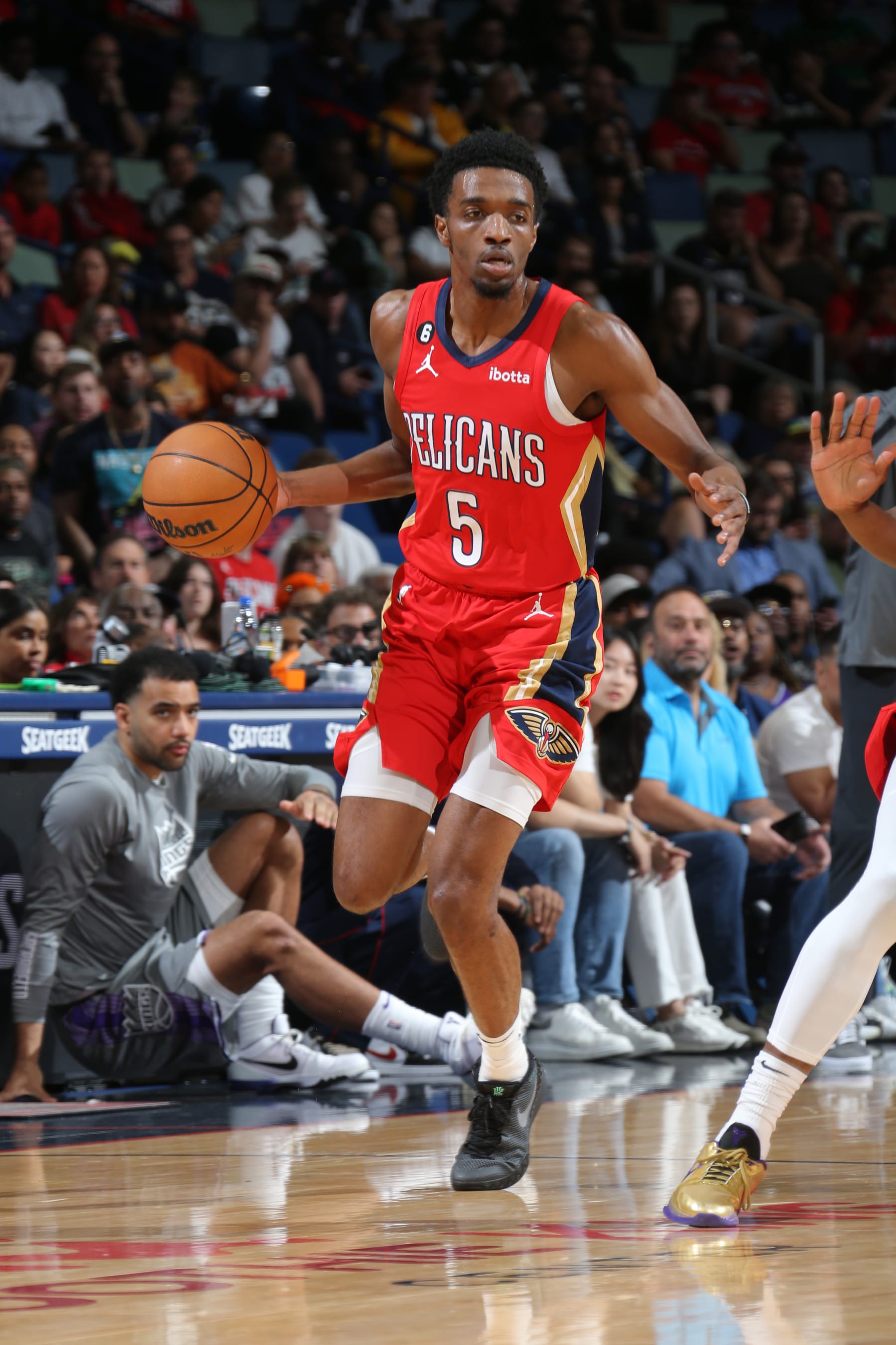 NEW ORLEANS, LA - APRIL 4: Herbert Jones #5 of the New Orleans Pelicans dribbles the ball during the game against the Sacramento Kings on April 4, 2023 at the Smoothie King Center in New Orleans, Louisiana. NOTE TO USER: User expressly acknowledges and agrees that, by downloading and or using this Photograph, user is consenting to the terms and conditions of the Getty Images License Agreement. Mandatory Copyright Notice: Copyright 2023 NBAE (Photo by Layne Murdoch Jr./NBAE via Getty Images)