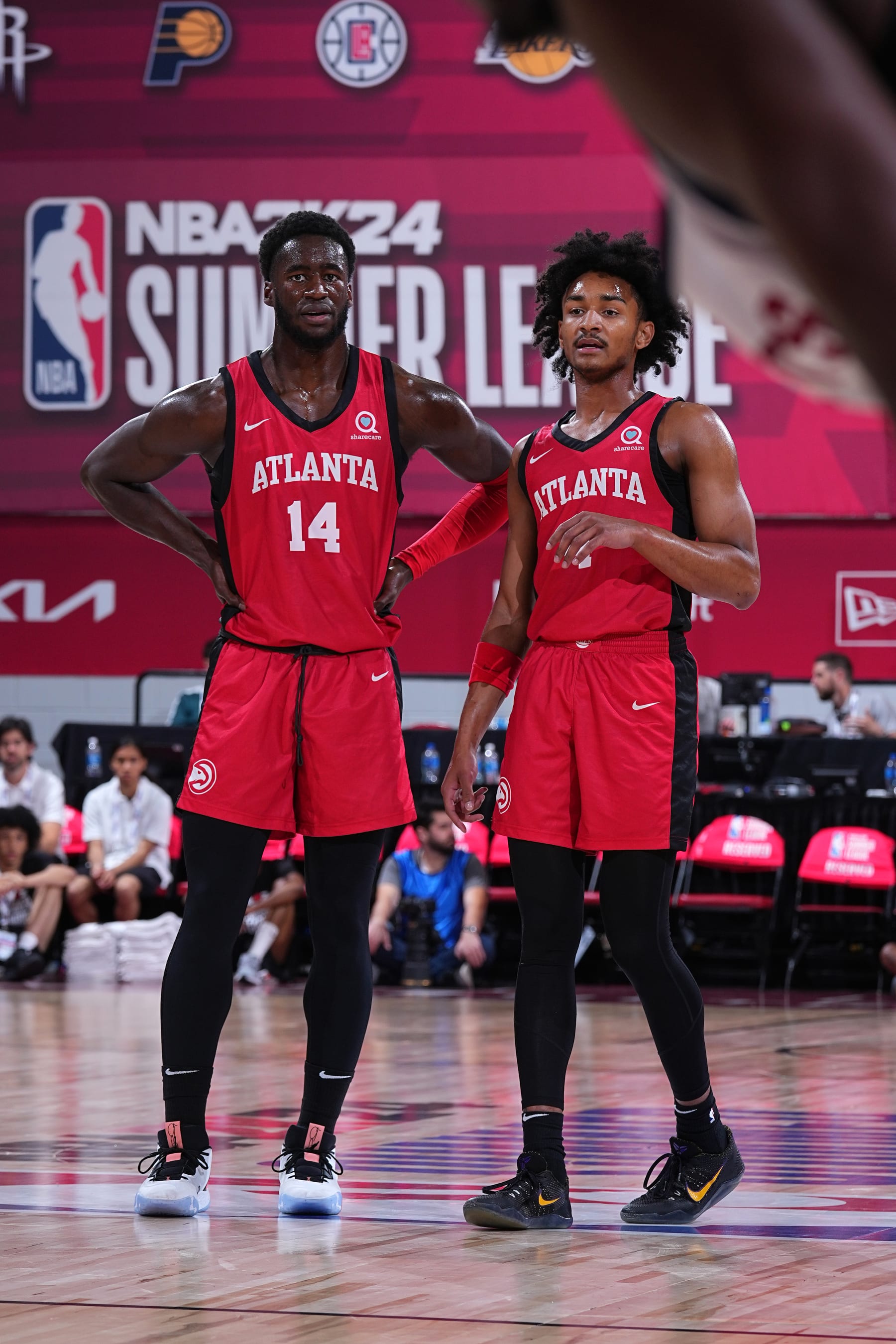 LAS VEGAS, NV - JULY 9: AJ Griffin #14 of the Atlanta Hawks and Kobe Bufkin #4 look on during the 2023 NBA Las Vegas Summer League on July 9, 2023 at the Cox Pavilion in Las Vegas, Nevada. NOTE TO USER: User expressly acknowledges and agrees that, by downloading and or using this photograph, User is consenting to the terms and conditions of the Getty Images License Agreement. Mandatory Copyright Notice: Copyright 2023 NBAE (Photo by Bart Young/NBAE via Getty Images)