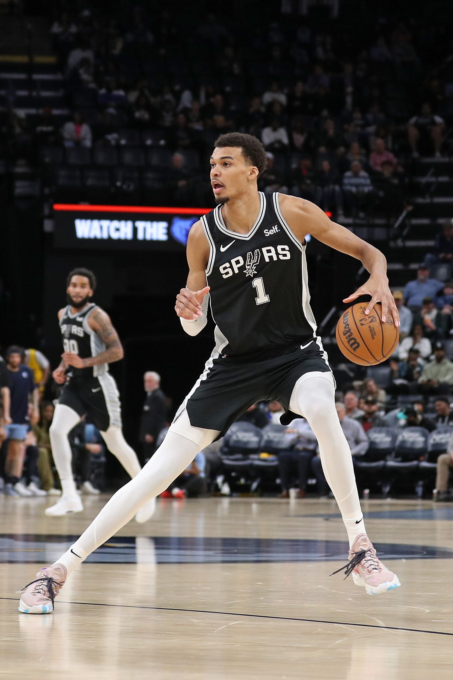 MEMPHIS, TENNESSEE - APRIL 09: Victor Wembanyama #1 of the San Antonio Spurs handles the ball during the game against the Memphis Grizzlies at FedExForum on April 09, 2024 in Memphis, Tennessee. NOTE TO USER: User expressly acknowledges and agrees that, by downloading and or using this photograph, User is consenting to the terms and conditions of the Getty Images License Agreement. (Photo by Justin Ford/Getty Images)