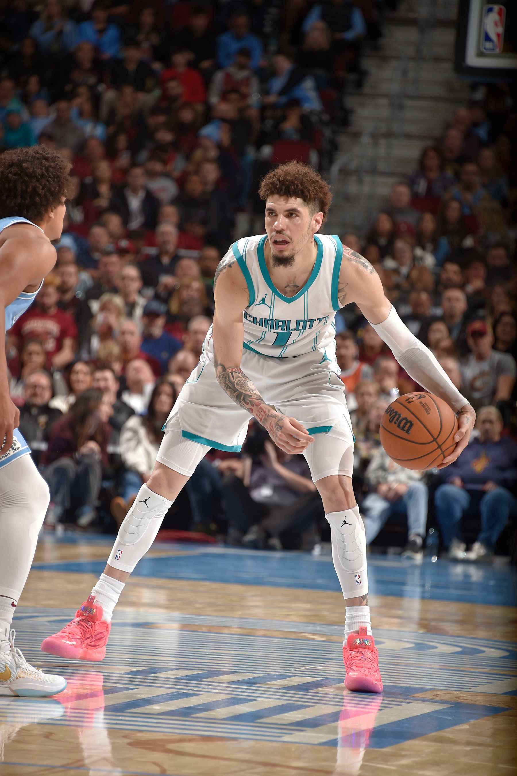CLEVELAND, OH - NOVEMBER 17: LaMelo Ball #1 of the Charlotte Hornets dribbles the ball during the game against the Cleveland Cavaliers on November 17, 2024 at Rocket Mortgage FieldHouse in Cleveland, Ohio. NOTE TO USER: User expressly acknowledges and agrees that, by downloading and/or using this Photograph, user is consenting to the terms and conditions of the Getty Images License Agreement. Mandatory Copyright Notice: Copyright 2024 NBAE (Photo by David Liam Kyle/NBAE via Getty Images)