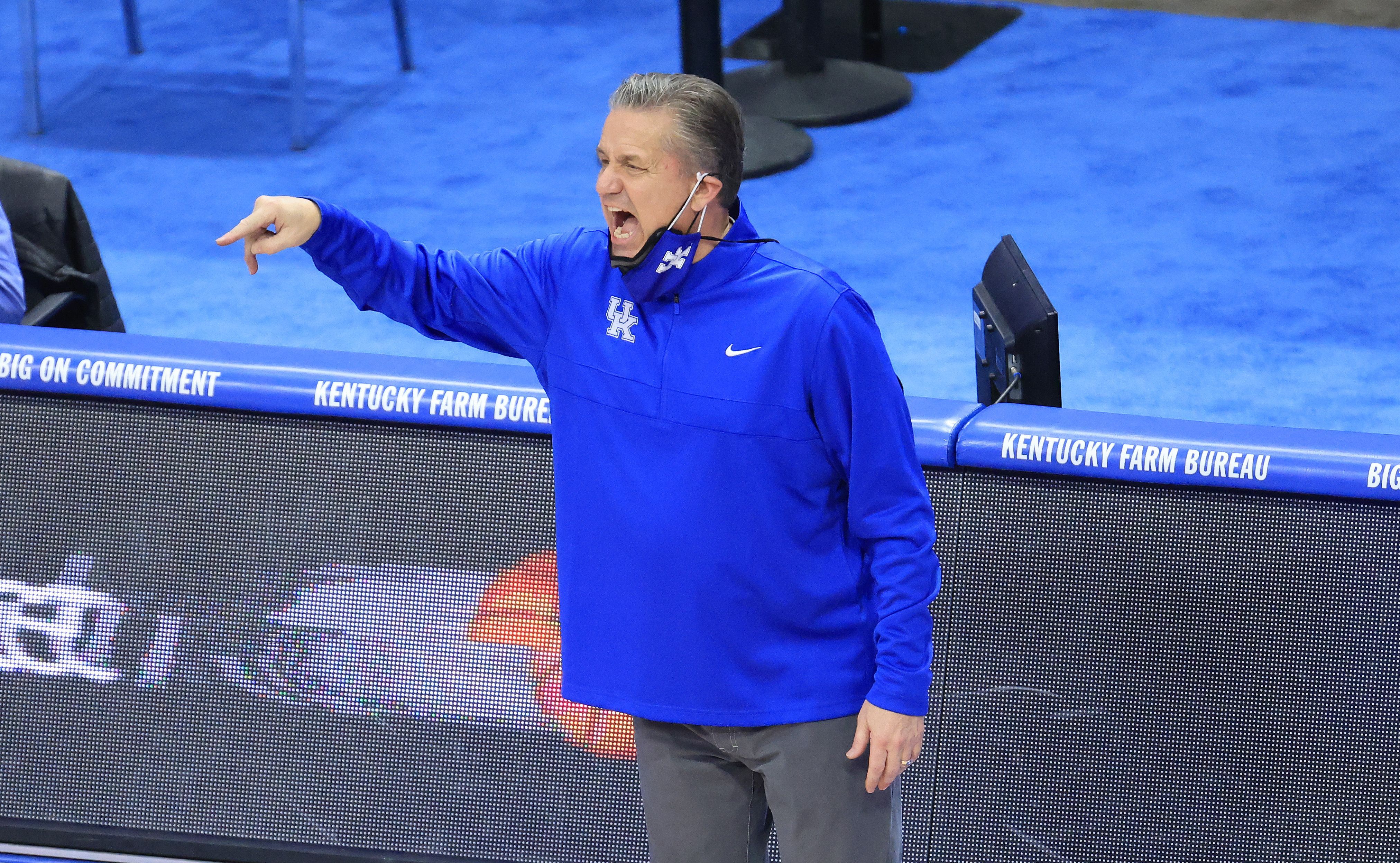 LEXINGTON, KENTUCKY - FEBRUARY 09:   John Calipari the head coach of the Kentucky Wildcats shoots gives instructions to his team against the Arkansas Razorbacks at Rupp Arena on February 09, 2021 in Lexington, Kentucky. (Photo by Andy Lyons/Getty Images)