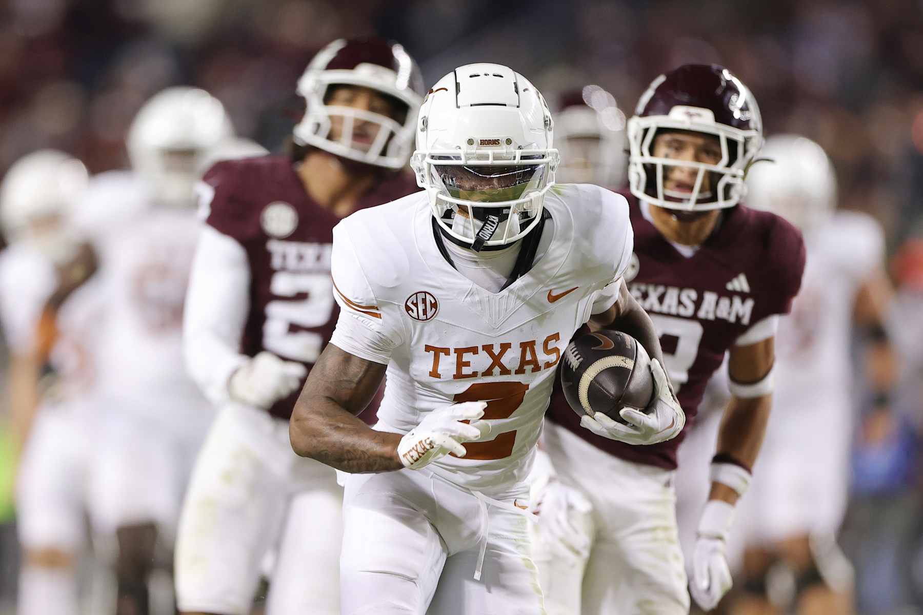 COLLEGE STATION, TEXAS - NOVEMBER 30: Matthew Golden #2 of the Texas Longhorns  runs the ball against the Texas A&M Aggies during the second half at Kyle Field on November 30, 2024 in College Station, Texas.  (Photo by Alex Slitz/Getty Images)