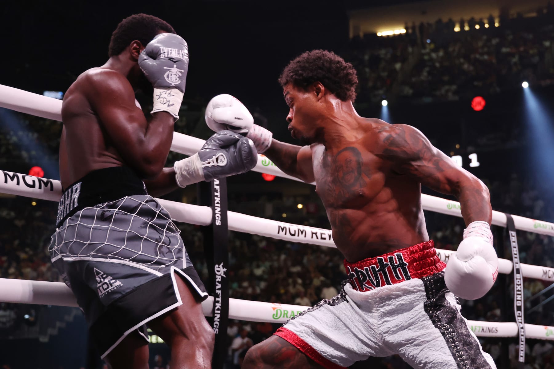 LAS VEGAS, NEVADA - JULY 29: Errol Spence Jr. punches Terence Crawford during round 1 of the World Welterweight Championship bout at T-Mobile Arena on July 29, 2023 in Las Vegas, Nevada. (Photo by Al Bello/Getty Images)
