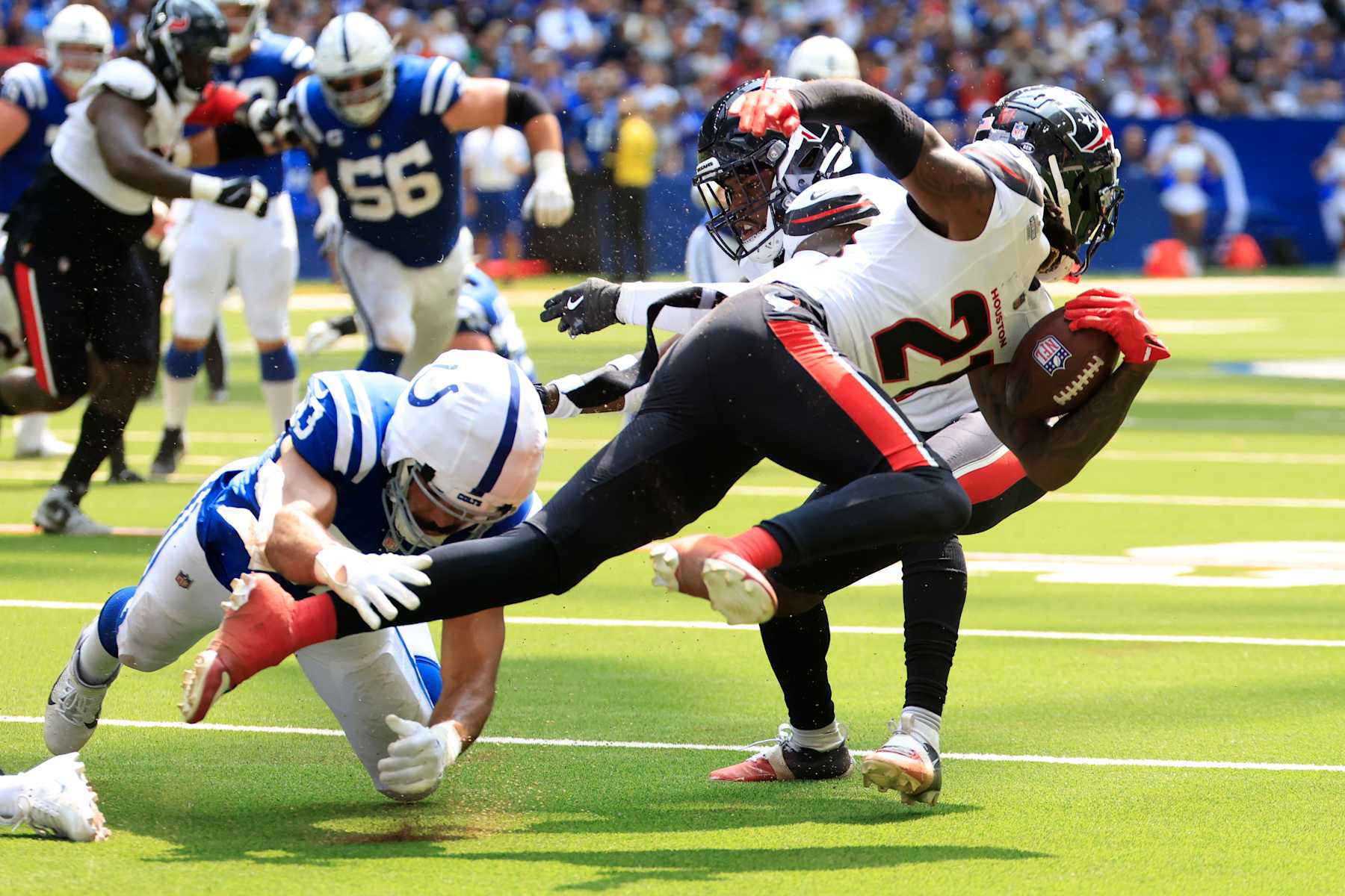 INDIANAPOLIS, INDIANA - SEPTEMBER 08: Calen Bullock #21 of the Houston Texans runs with the ball after an interception in the second quarter of the game against the Indianapolis Colts at Lucas Oil Stadium on September 08, 2024 in Indianapolis, Indiana. (Photo by Justin Casterline/Getty Images)