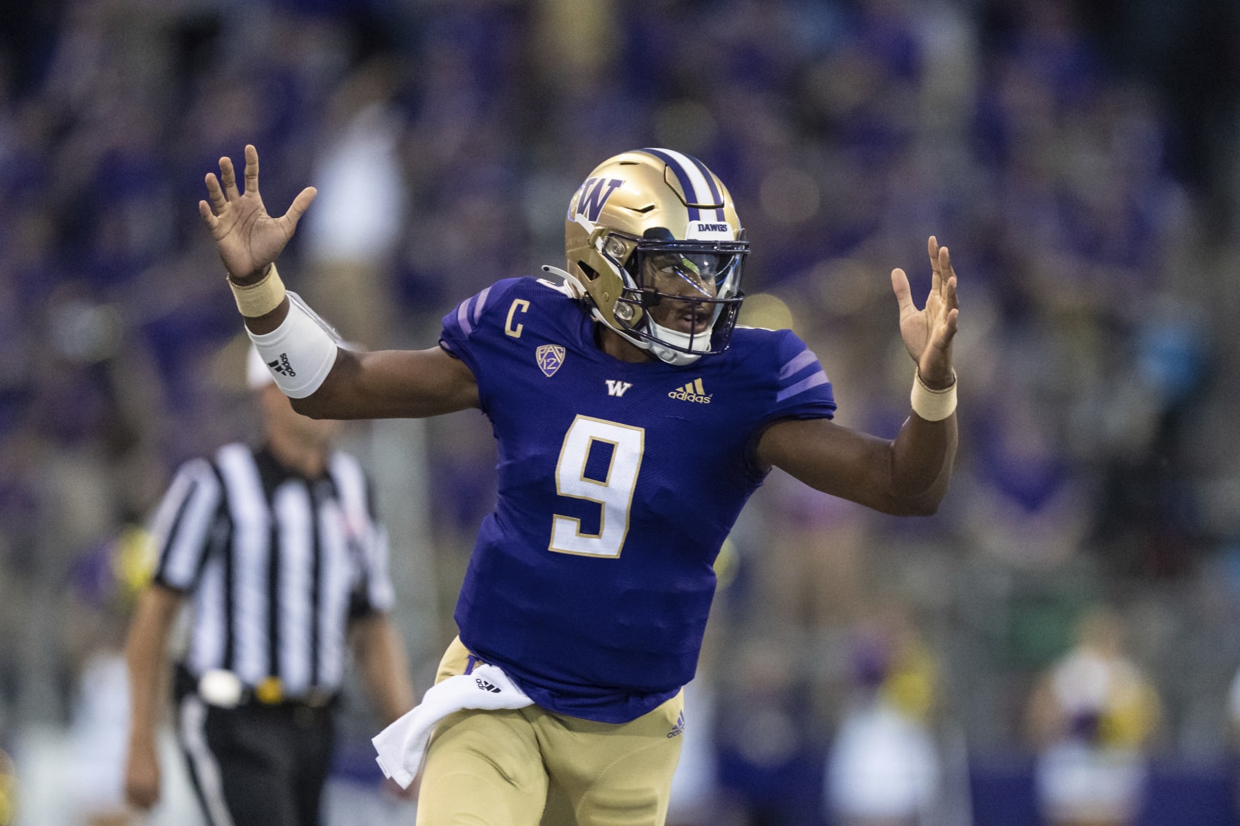 Washington quarterback Michael Penix Jr. celebrates a touchdown against Kent State during an NCAA football game on Saturday, Sept. 3, 2022, in Seattle. (AP Photo/Stephen Brashear)