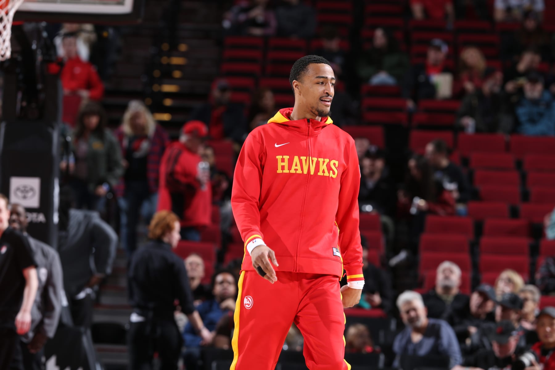 PORTLAND, OR - JANUARY 30: John Collins #20 of the Atlanta Hawks smiles before the game against the Portland Trail Blazers on January 30, 2023 at the Moda Center Arena in Portland, Oregon. NOTE TO USER: User expressly acknowledges and agrees that, by downloading and or using this photograph, user is consenting to the terms and conditions of the Getty Images License Agreement. Mandatory Copyright Notice: Copyright 2023 NBAE (Photo by Sam Forencich/NBAE via Getty Images)