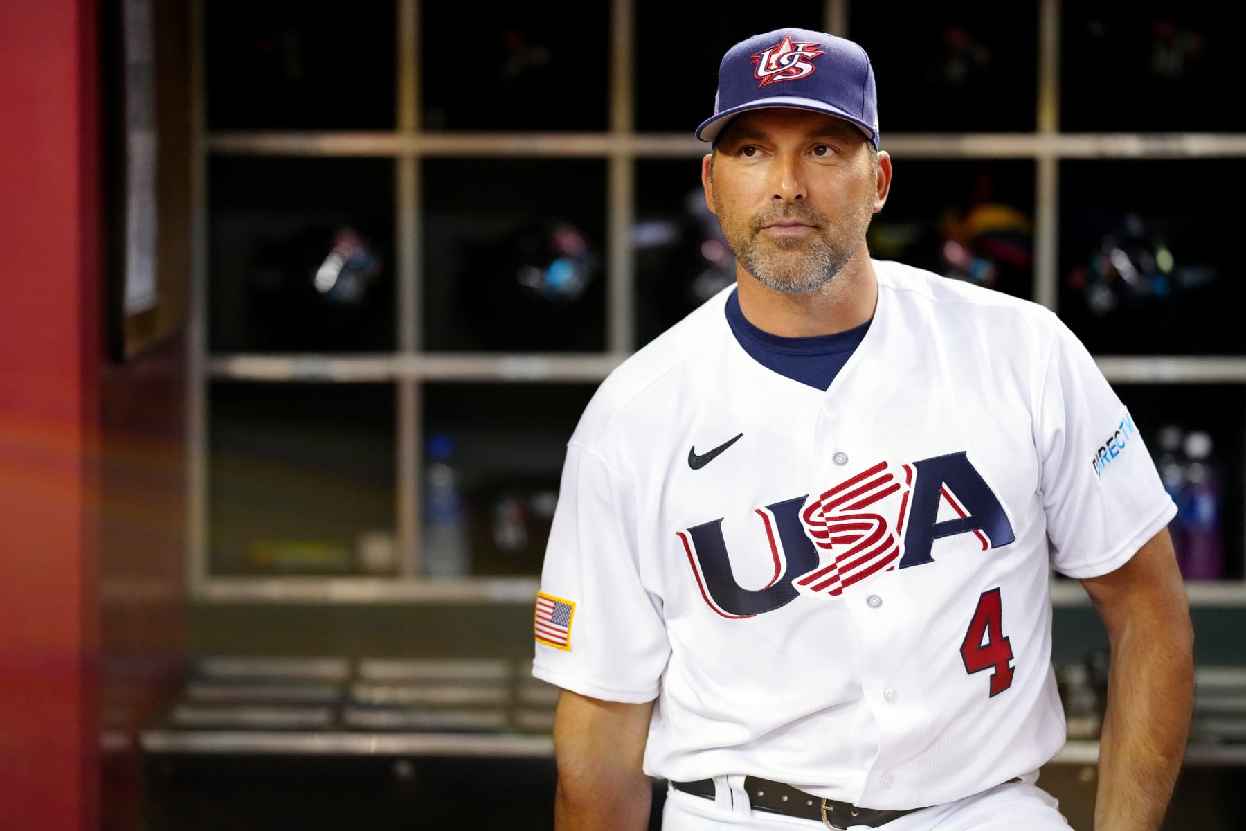 PHOENIX, AZ - MARCH 12:  Manager Mark DeRosa #4 of Team USA looks on from the dugout prior to Game 4 of Pool C between Team Mexico and Team USA at Chase Field on Sunday, March 12, 2023 in Phoenix, Arizona. (Photo by Daniel Shirey/WBCI/MLB Photos via Getty Images)