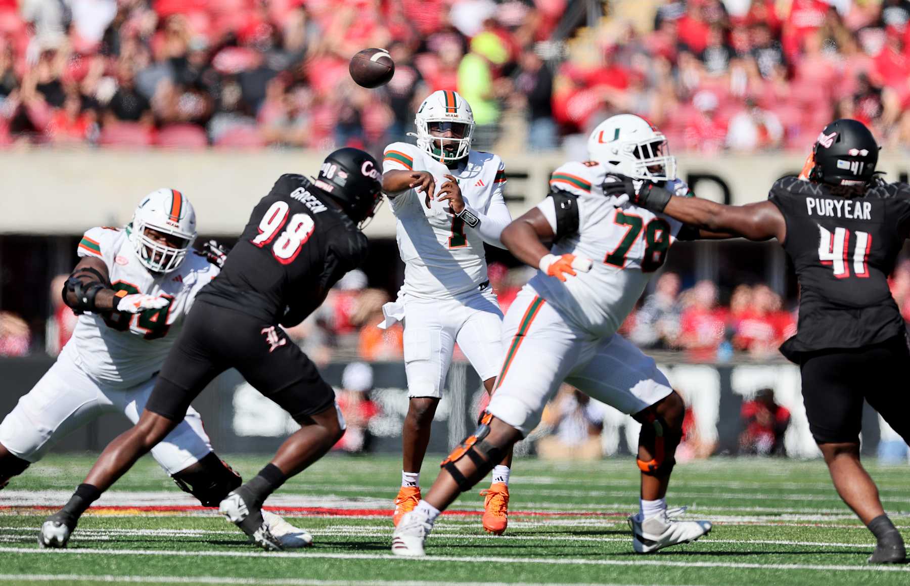 LOUISVILLE, KENTUCKY - OCTOBER 19: Cam Ward #1 of the Miami Hurricanes throws the ball against the Louisville Cardinals at Cardinal Stadium on October 19, 2024 in Louisville, Kentucky. (Photo by Andy Lyons/Getty Images)