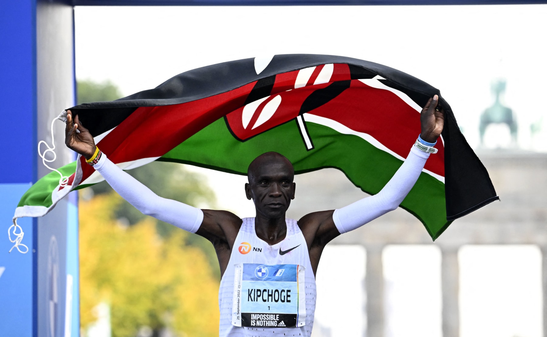 TOPSHOT - Kenya's Eliud Kipchoge crosses the finish line to win the Berlin Marathon race on September 25, 2022 in Berlin. - Kipchoge has beaten his own world record by 30 seconds, running 2:01:09 at the Berlin Marathon. (Photo by Tobias SCHWARZ / AFP) / The erroneous mention[s] appearing in the metadata of this photo by Tobias SCHWARZ has been modified in AFP systems in the following manner: [Kipchoge has beaten his own world record by 30 seconds, running 2:01:09 at the Berlin Marathon] instead of [Kipchoge has beaten his own world record by 29 seconds, running 2:01:10 at the Berlin Marathon.]. Please immediately remove the erroneous mention[s] from all your online services and delete it (them) from your servers. If you have been authorized by AFP to distribute it (them) to third parties, please ensure that the same actions are carried out by them. Failure to promptly comply with these instructions will entail liability on your part for any continued or post notification usage. Therefore we thank you very much for all your attention and prompt action. We are sorry for the inconvenience this notification may cause and remain at your disposal for any further information you may require. (Photo by TOBIAS SCHWARZ/AFP via Getty Images)