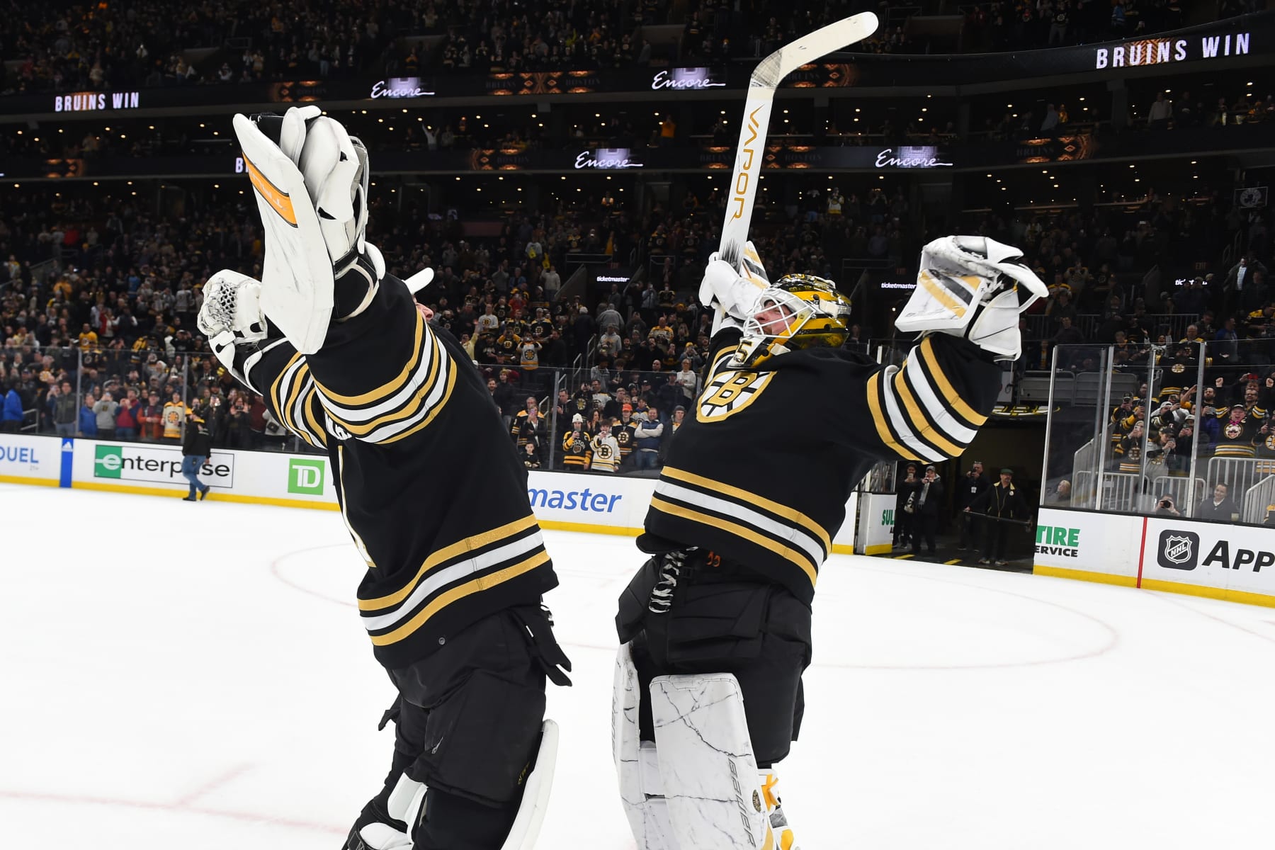 BOSTON, MASSACHUSETTS - MARCH 9: Jeremy Swayman #1 and Linus Ullmark #35 of the Boston Bruins celebrate the win against the Pittsburgh Penguins at the TD Garden on March 9, 2024 in Boston, Massachusetts. (Photo by Steve Babineau/NHLI via Getty Images)