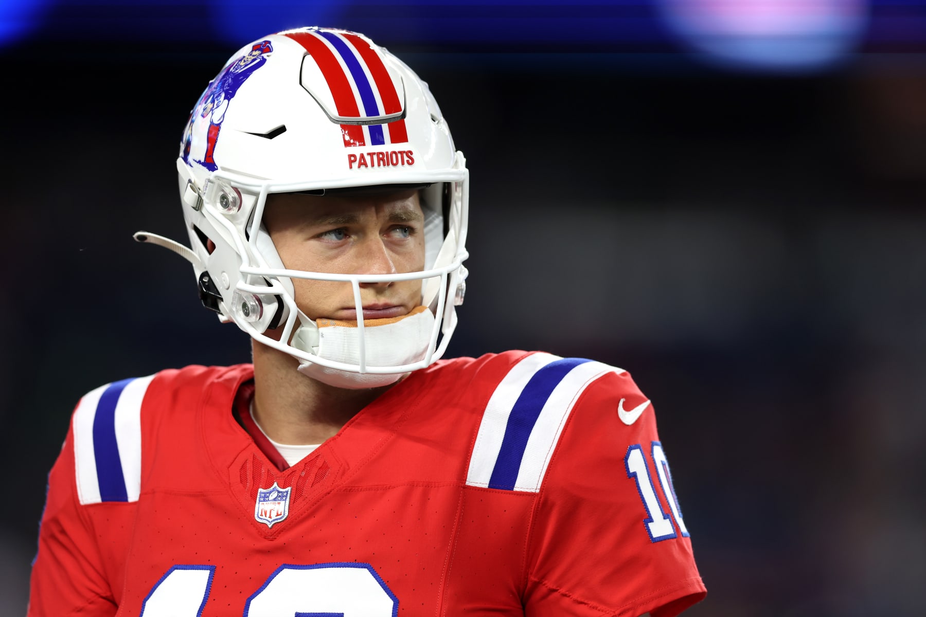 FOXBOROUGH, MASSACHUSETTS - SEPTEMBER 17: Mac Jones #10 of the New England Patriots looks on prior to a game against the Miami Dolphins at Gillette Stadium on September 17, 2023 in Foxborough, Massachusetts. (Photo by Adam Glanzman/Getty Images)