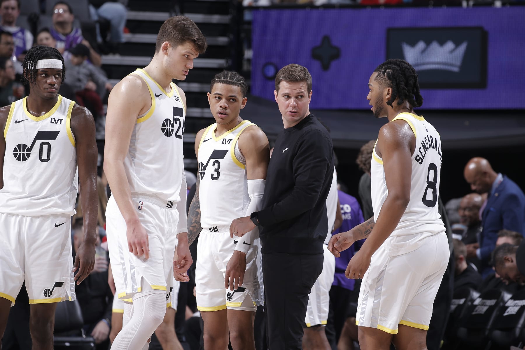 SACRAMENTO, CA - MARCH 31: Head Coach Will Hardy of the Utah Jazz coaches Taylor Hendricks #0, Walker Kessler #24, Keyonte George #3, and Brice Sensabaugh #8 during the game against the Sacramento Kings on March 31, 2024 at Golden 1 Center in Sacramento, California. NOTE TO USER: User expressly acknowledges and agrees that, by downloading and or using this photograph, User is consenting to the terms and conditions of the Getty Images Agreement. Mandatory Copyright Notice: Copyright 2024 NBAE (Photo by Rocky Widner/NBAE via Getty Images)
