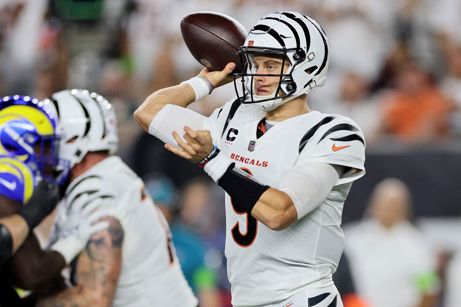 CINCINNATI, OHIO - SEPTEMBER 25: Joe Burrow #9 of the Cincinnati Bengals looks to throw a pass against the Los Angeles Rams during the first quarter in the game at Paycor Stadium on September 25, 2023 in Cincinnati, Ohio. (Photo by Andy Lyons/Getty Images)