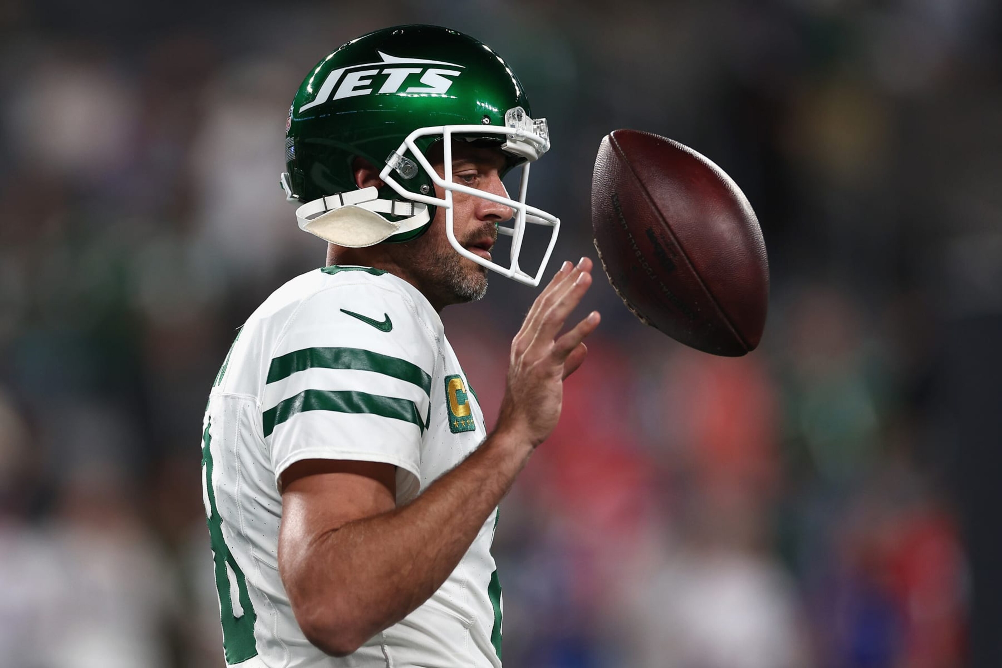 EAST RUTHERFORD, NEW JERSEY - SEPTEMBER 11: Quarterback Aaron Rodgers #8 of the New York Jets warms up before the NFL game against the Buffalo Bills at MetLife Stadium on September 11, 2023 in East Rutherford, New Jersey. (Photo by Elsa/Getty Images) EAST RUTHERFORD, NEW JERSEY - SEPTEMBER 11: Quarterback Aaron Rodgers #8 of the New York Jets warms up before the NFL game against the Buffalo Bills at MetLife Stadium on September 11, 2023 in East Rutherford, New Jersey. (Photo by Elsa/Getty Images)