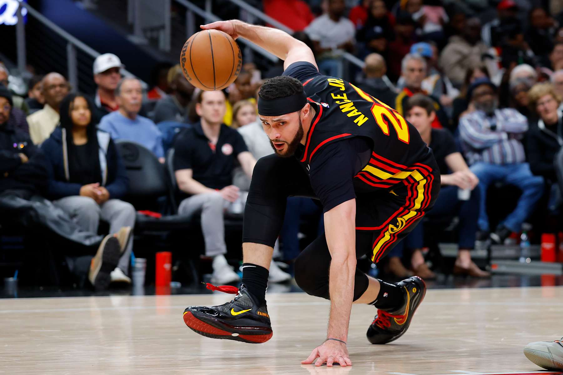 ATLANTA, GEORGIA - DECEMBER 28: Larry Nance Jr. #22 of the Atlanta Hawks loses his footing during the third quarter against the Miami Heat at State Farm Arena on December 28, 2024 in Atlanta, Georgia. NOTE TO USER: User expressly acknowledges and agrees that, by downloading and or using this photograph, User is consenting to the terms and conditions of the Getty Images License Agreement. (Photo by Todd Kirkland/Getty Images)