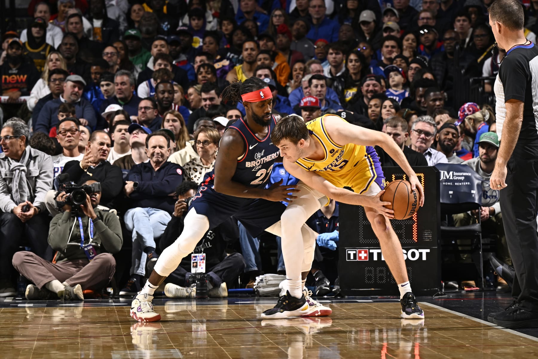 PHILADELPHIA, PA - NOVEMBER 27: Patrick Beverley #22 of the Philadelphia 76ers plays defense on Austin Reaves #15 of the Los Angeles Lakers on November 27, 2023 at the Wells Fargo Center in Philadelphia, Pennsylvania NOTE TO USER: User expressly acknowledges and agrees that, by downloading and/or using this Photograph, user is consenting to the terms and conditions of the Getty Images License Agreement. Mandatory Copyright Notice: Copyright 2023 NBAE (Photo by David Dow/NBAE via Getty Images)