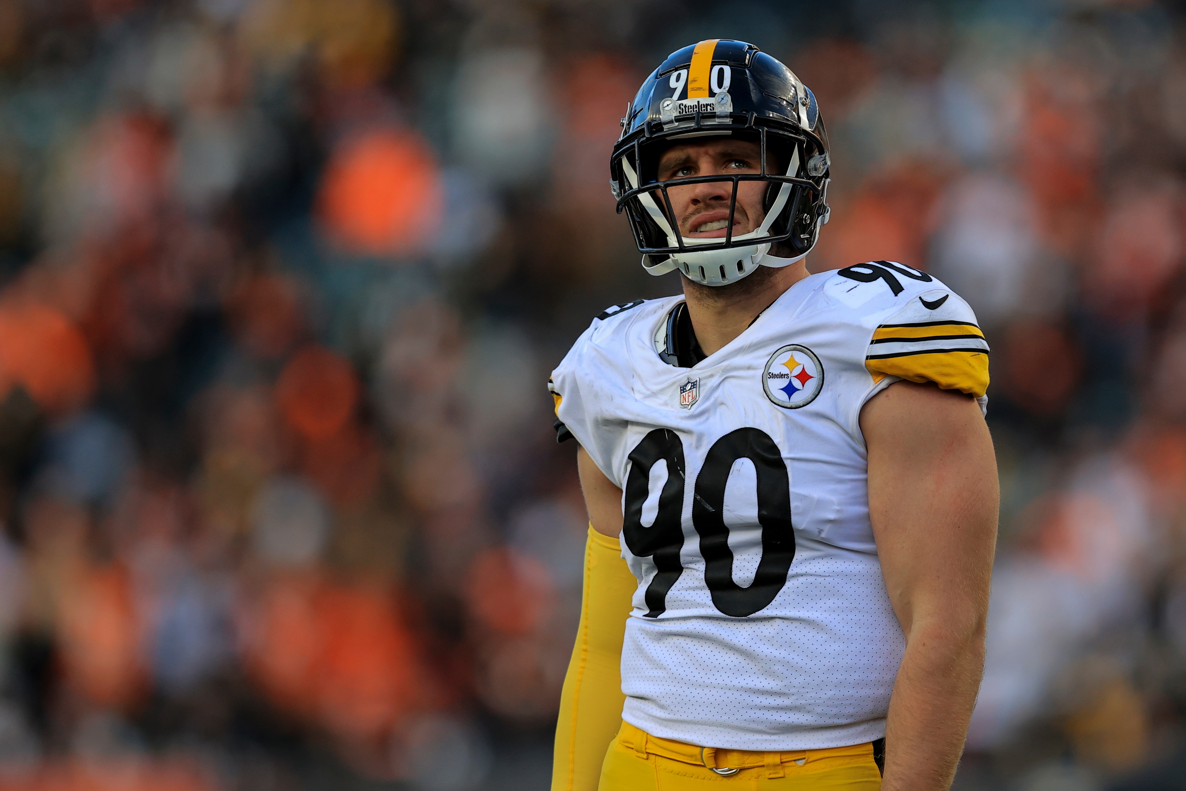 Pittsburgh Steelers outside linebacker T.J. Watt (90) stands on the field during an NFL football game against the Cincinnati Bengals, Sunday, Nov. 28, 2021, in Cincinnati. The Bengals won 41-10. (AP Photo/Aaron Doster)