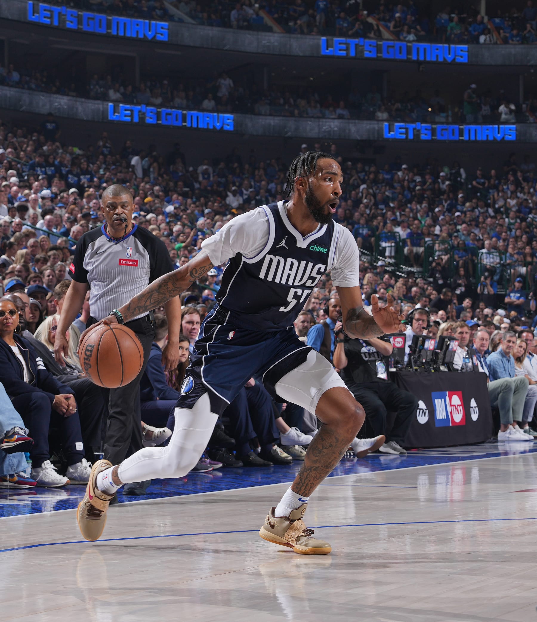 DALLAS, TX - MAY 26: Derrick Jones Jr. #55 of the Dallas Mavericks handles the ball during the game against the Minnesota Timberwolves during Game 3 of the Western Conference Finals of the 2024 NBA Playoffs on May 26, 2024 at the American Airlines Center in Dallas, Texas. NOTE TO USER: User expressly acknowledges and agrees that, by downloading and or using this photograph, User is consenting to the terms and conditions of the Getty Images License Agreement. Mandatory Copyright Notice: Copyright 2024 NBAE (Photo by Jesse D. Garrabrant/NBAE via Getty Images)